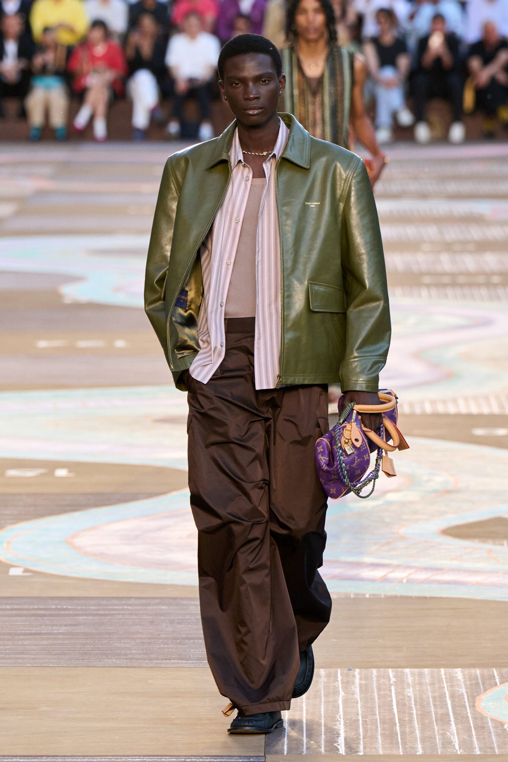 green leather jacket with beige shirt