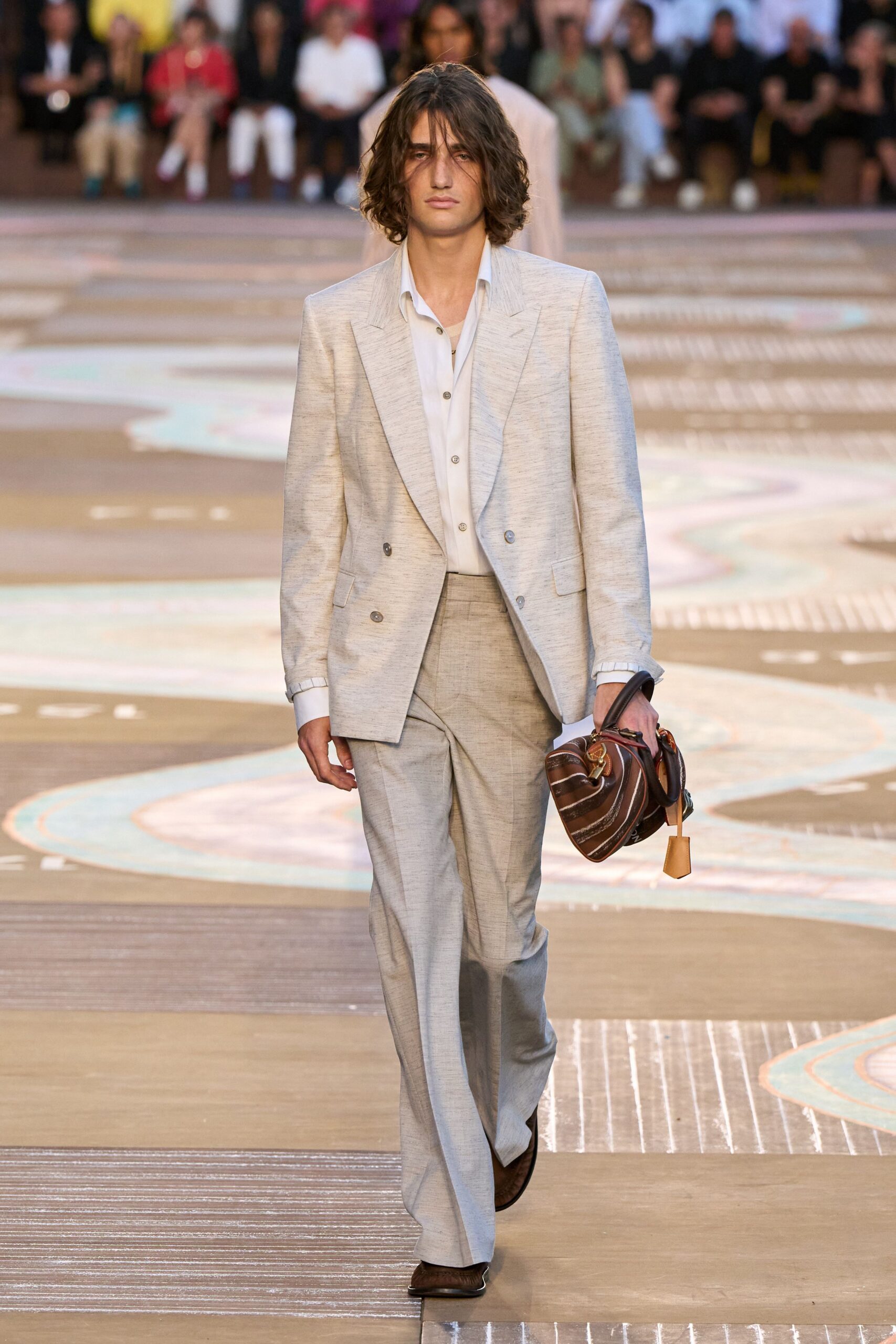 beige tailored suit with white shirt