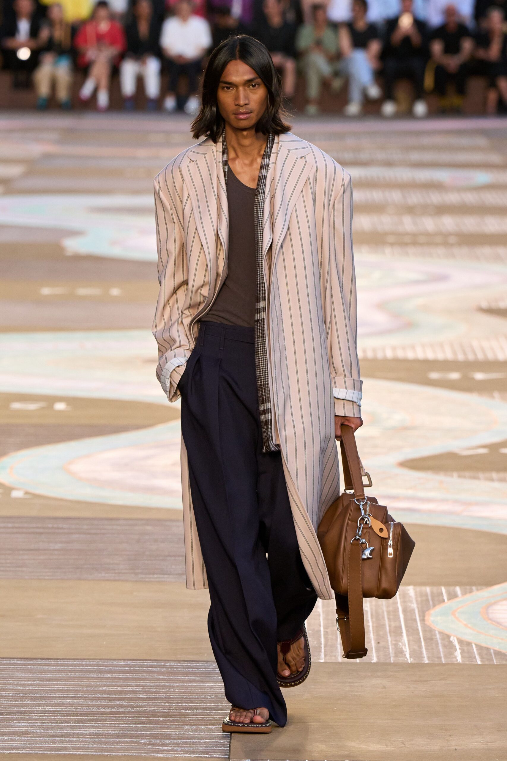 beige striped coat with navy pants
