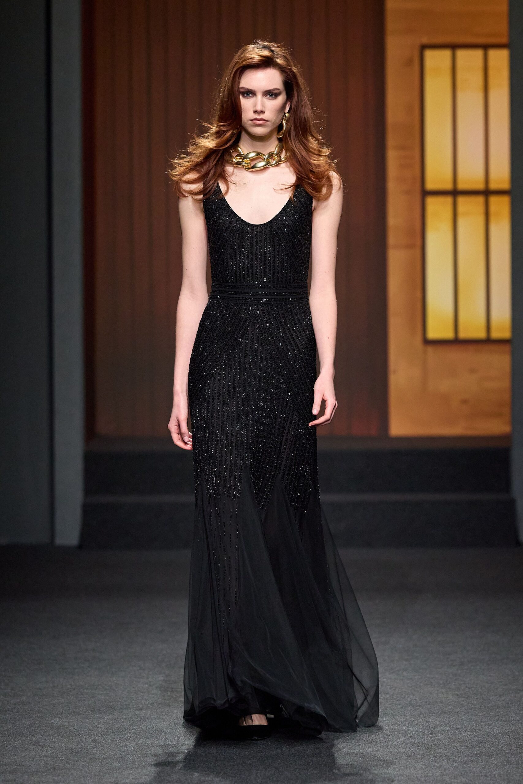 black beaded sleeveless gown