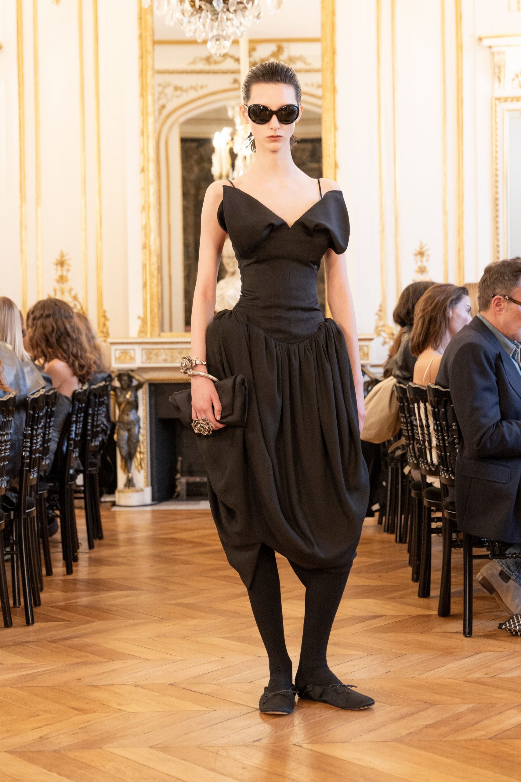 black midi dress with clutch