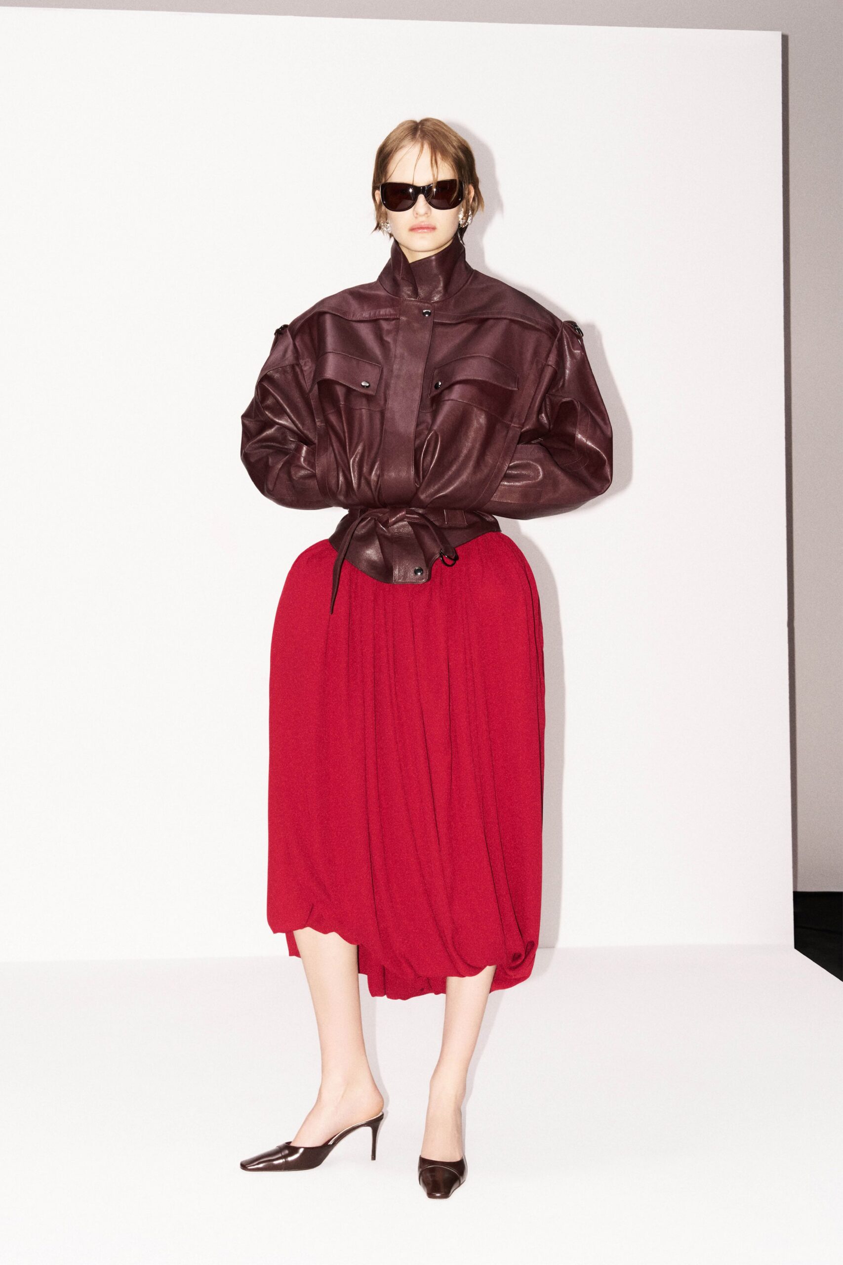 brown leather long-sleeve collared fitted zippered buttoned jacket