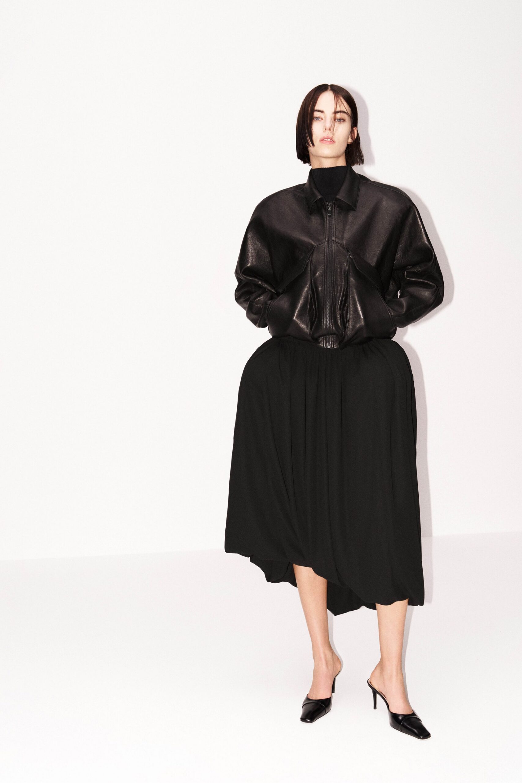 black leather long-sleeve collared relaxed zippered jacket