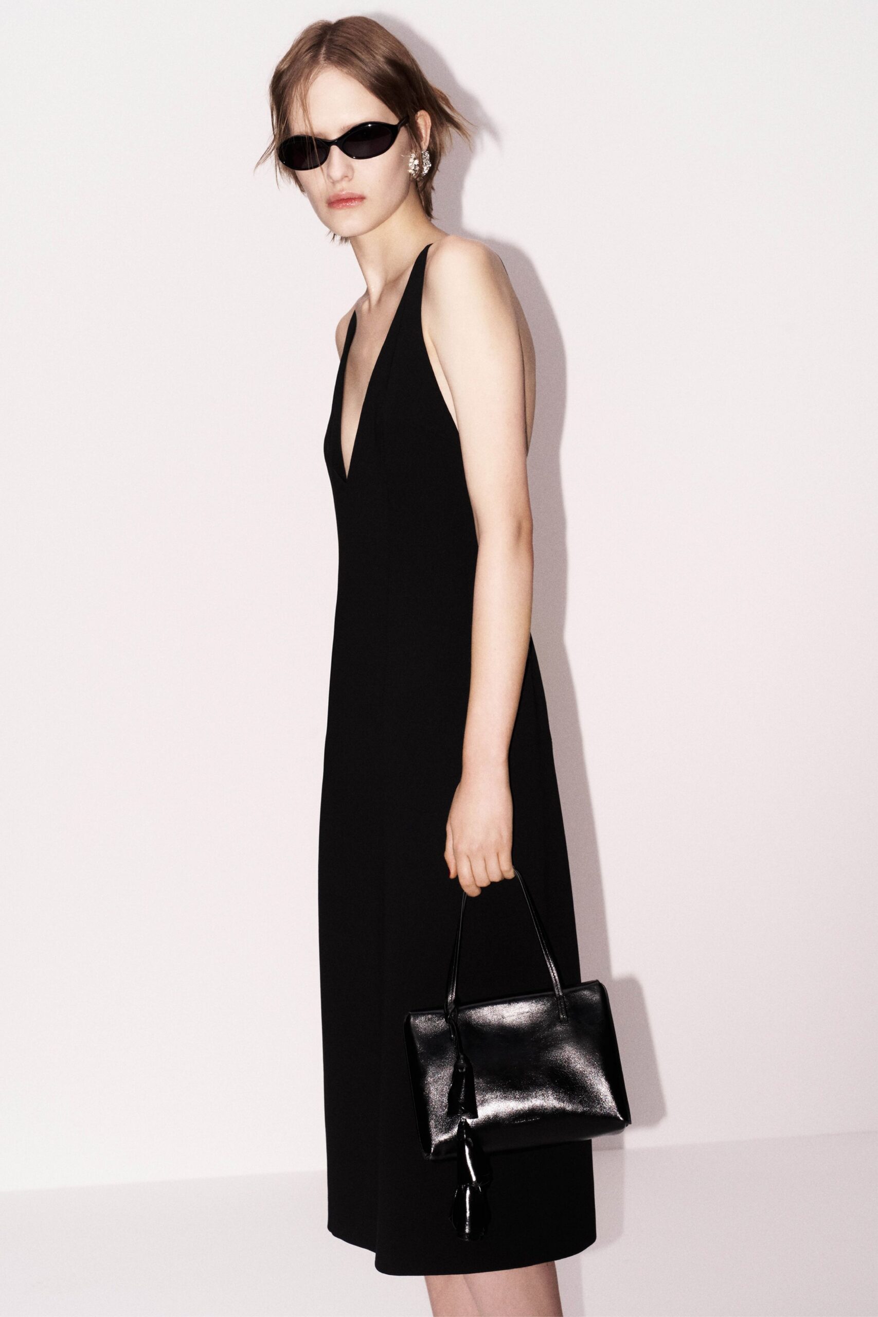 black midi dress with bag