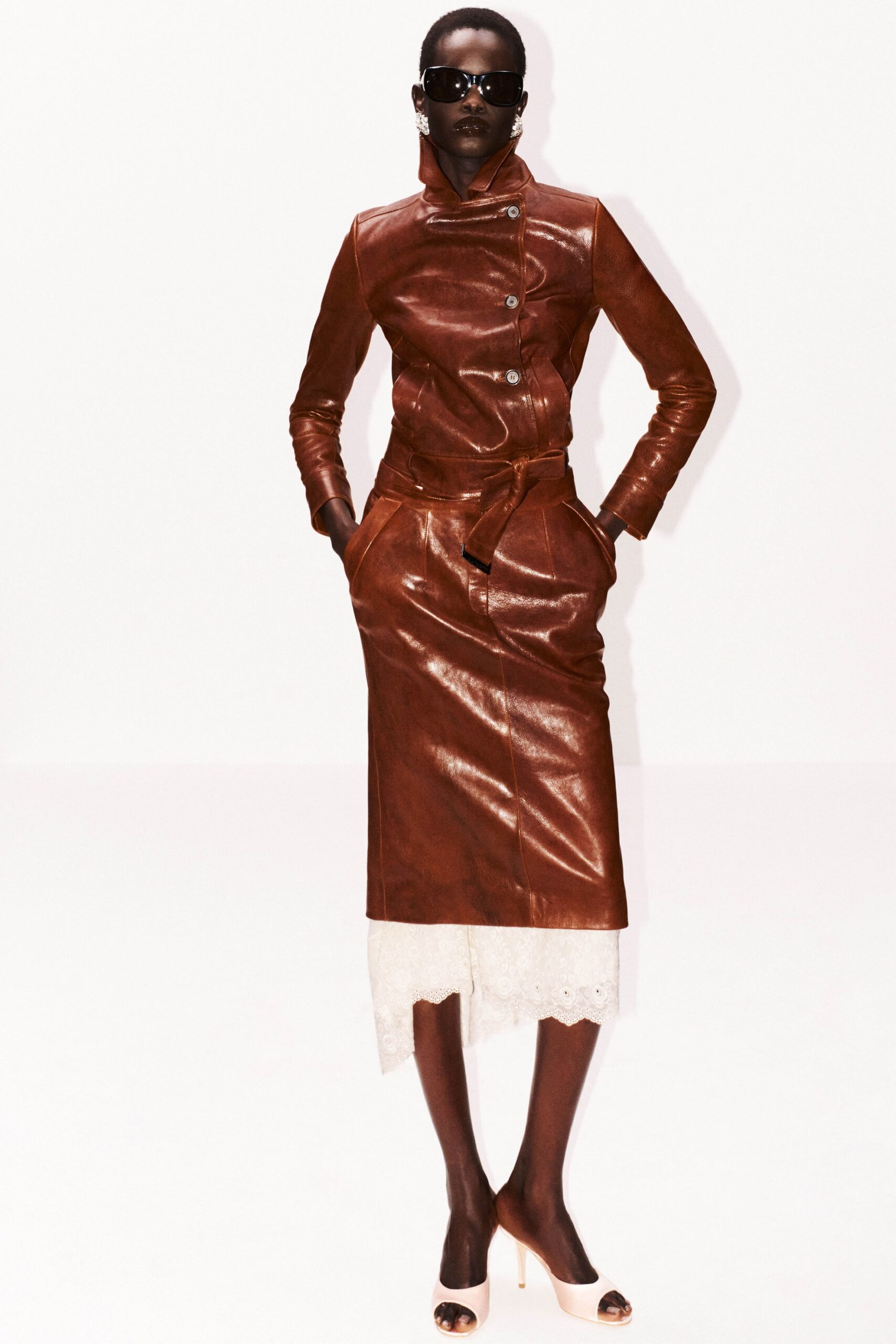 brown leather long-sleeve collared fitted belted shiny coat