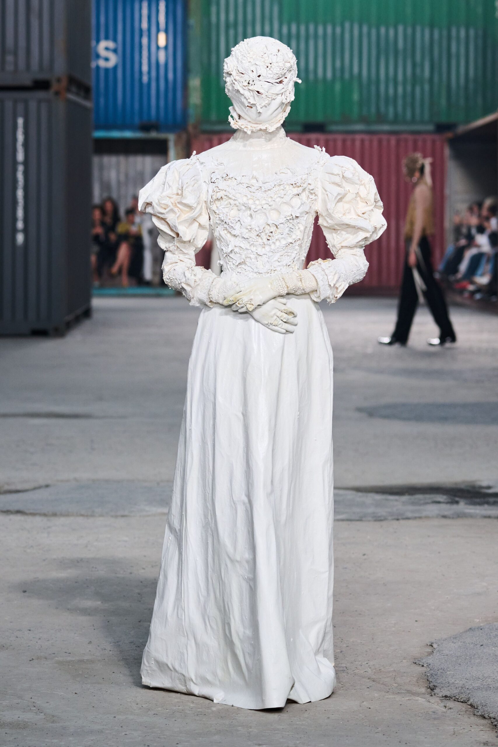 white silk long-sleeve gown