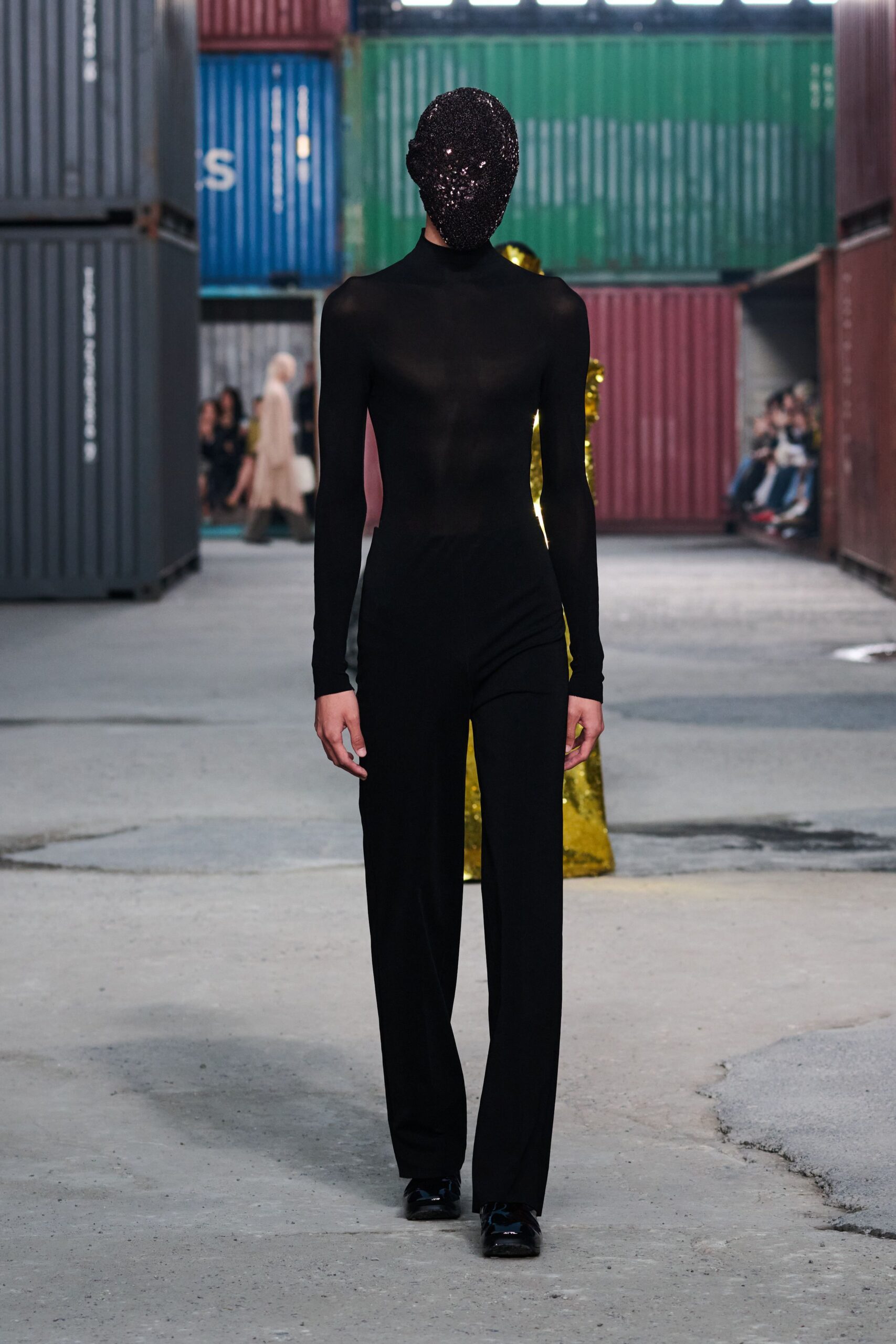 black silk long-sleeve turtleneck fitted sheer catsuit