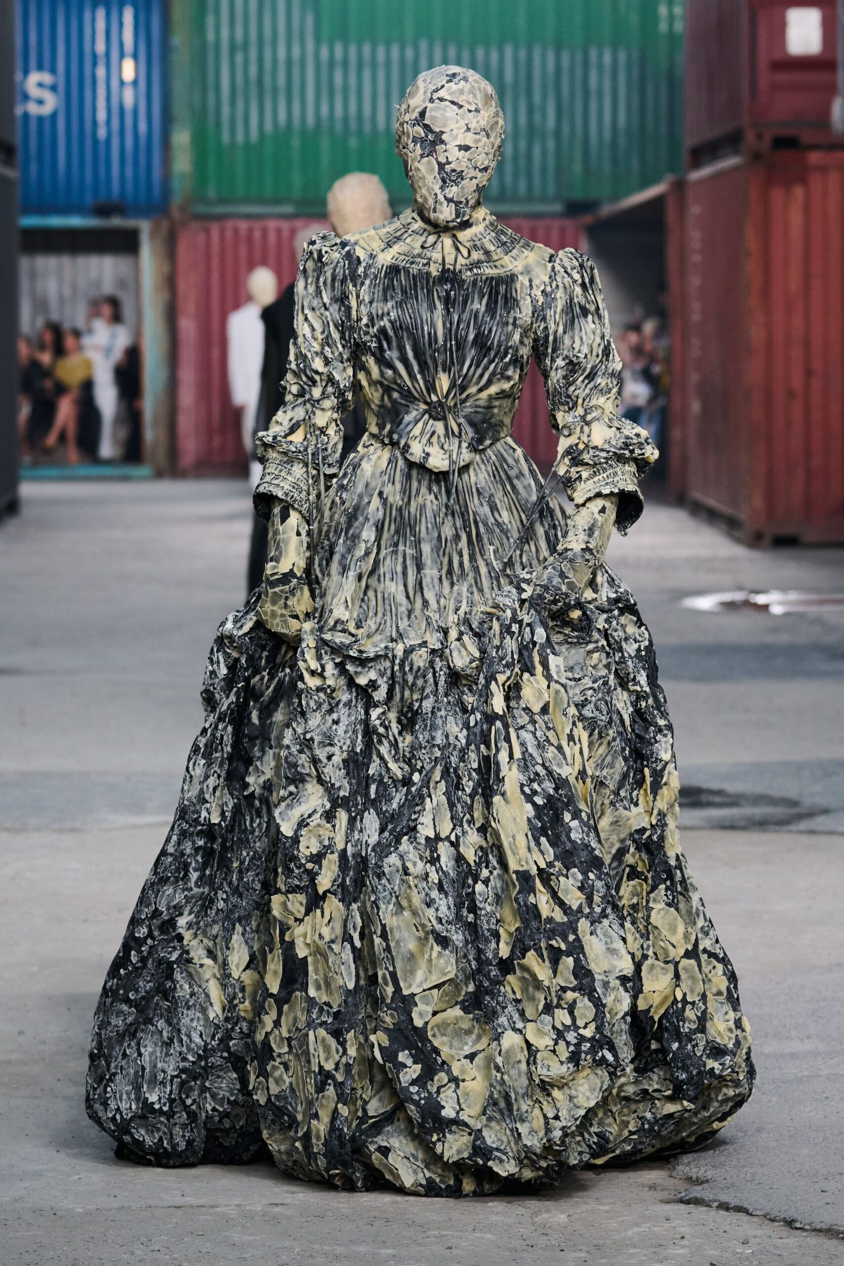 black and yellow pleated gown