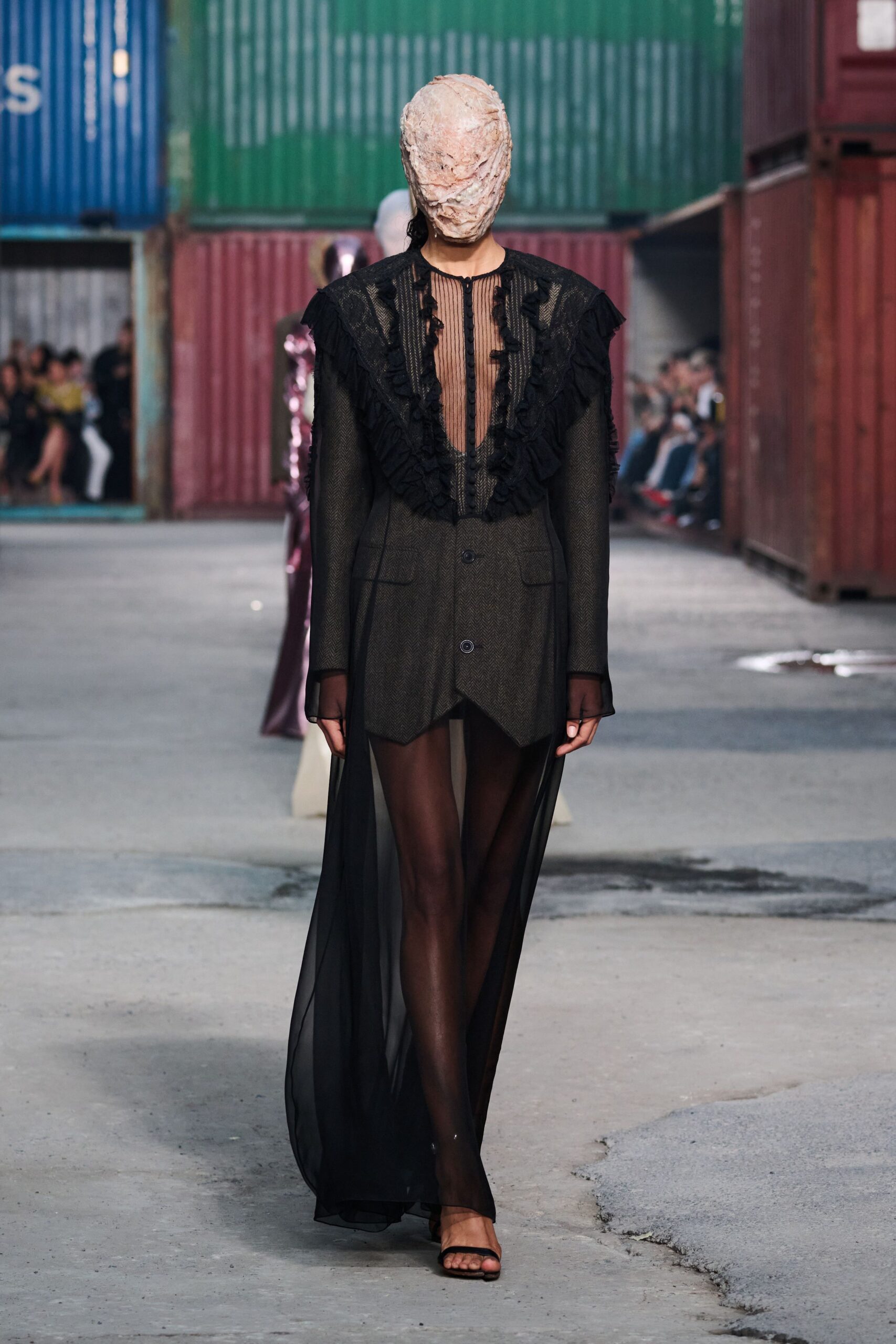black sleeveless v-neck fitted layered sheer flowing dress