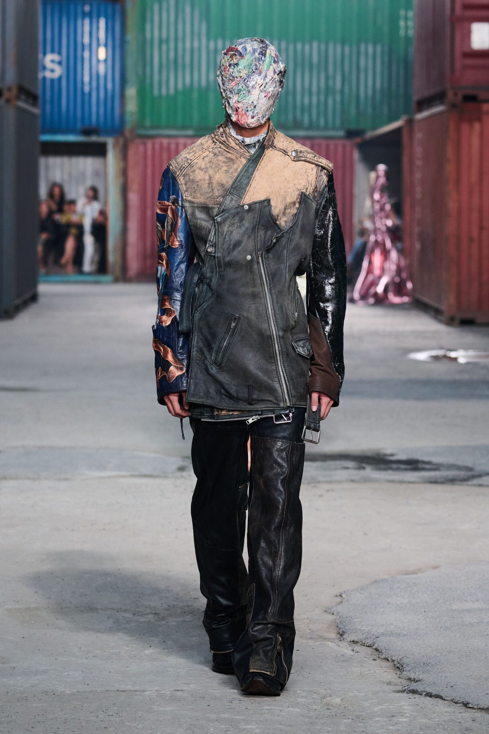 black leather relaxed jacket and fitted pants