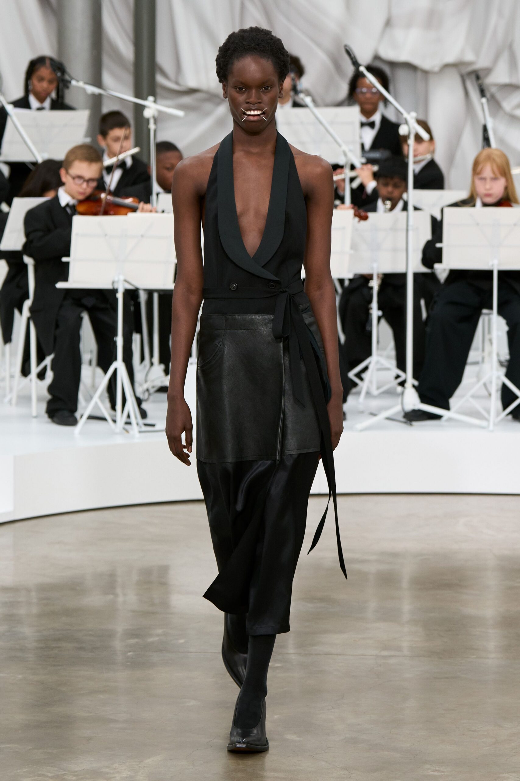 black leather sleeveless v-neck fitted belted midi dress