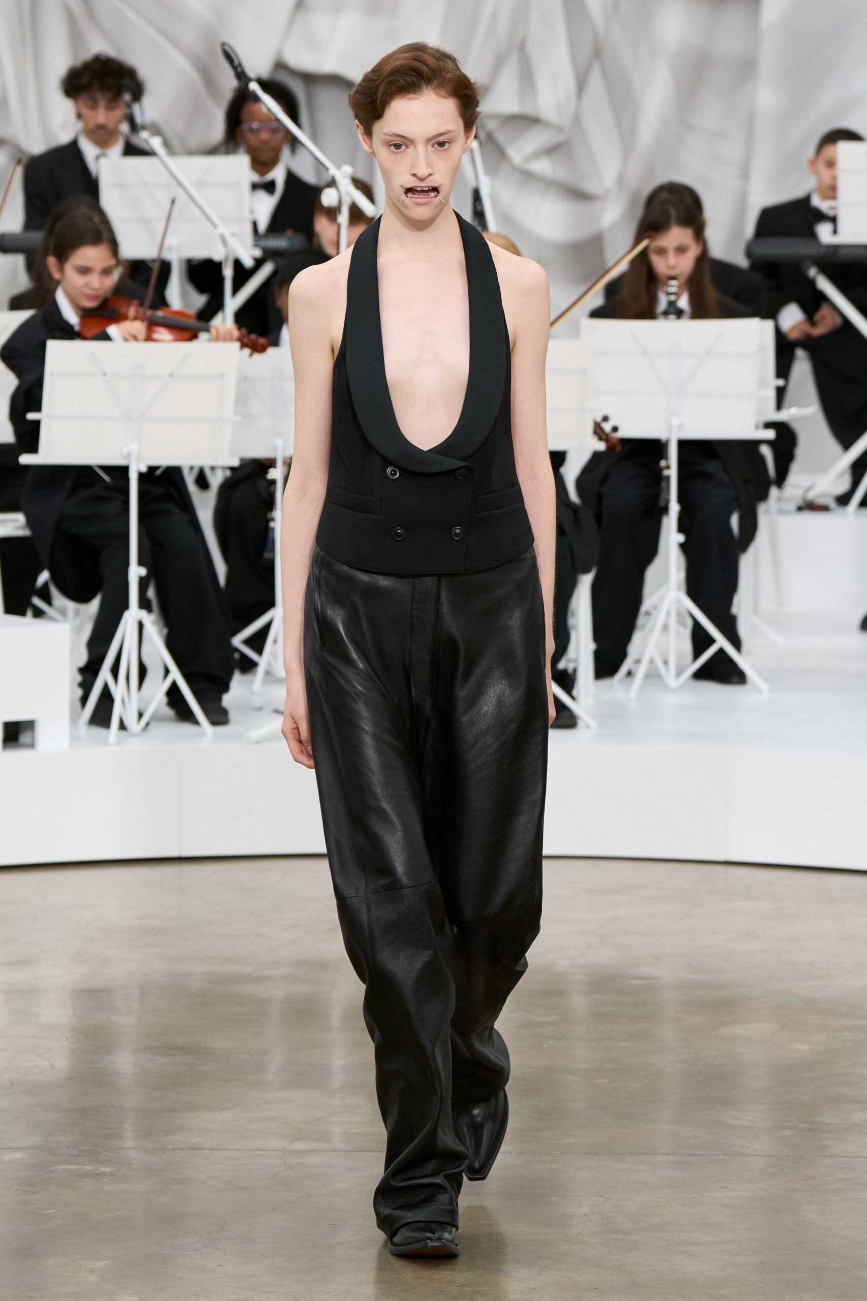 black leather sleeveless v-neck fitted top