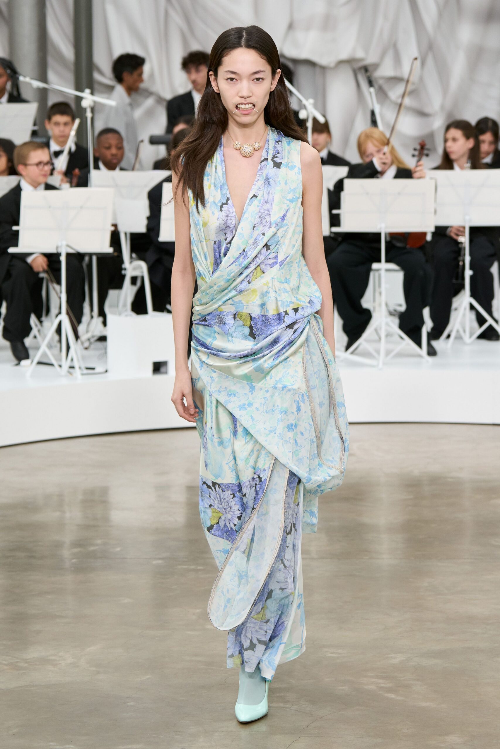 blue silk sleeveless v-neck fitted floral draped gown