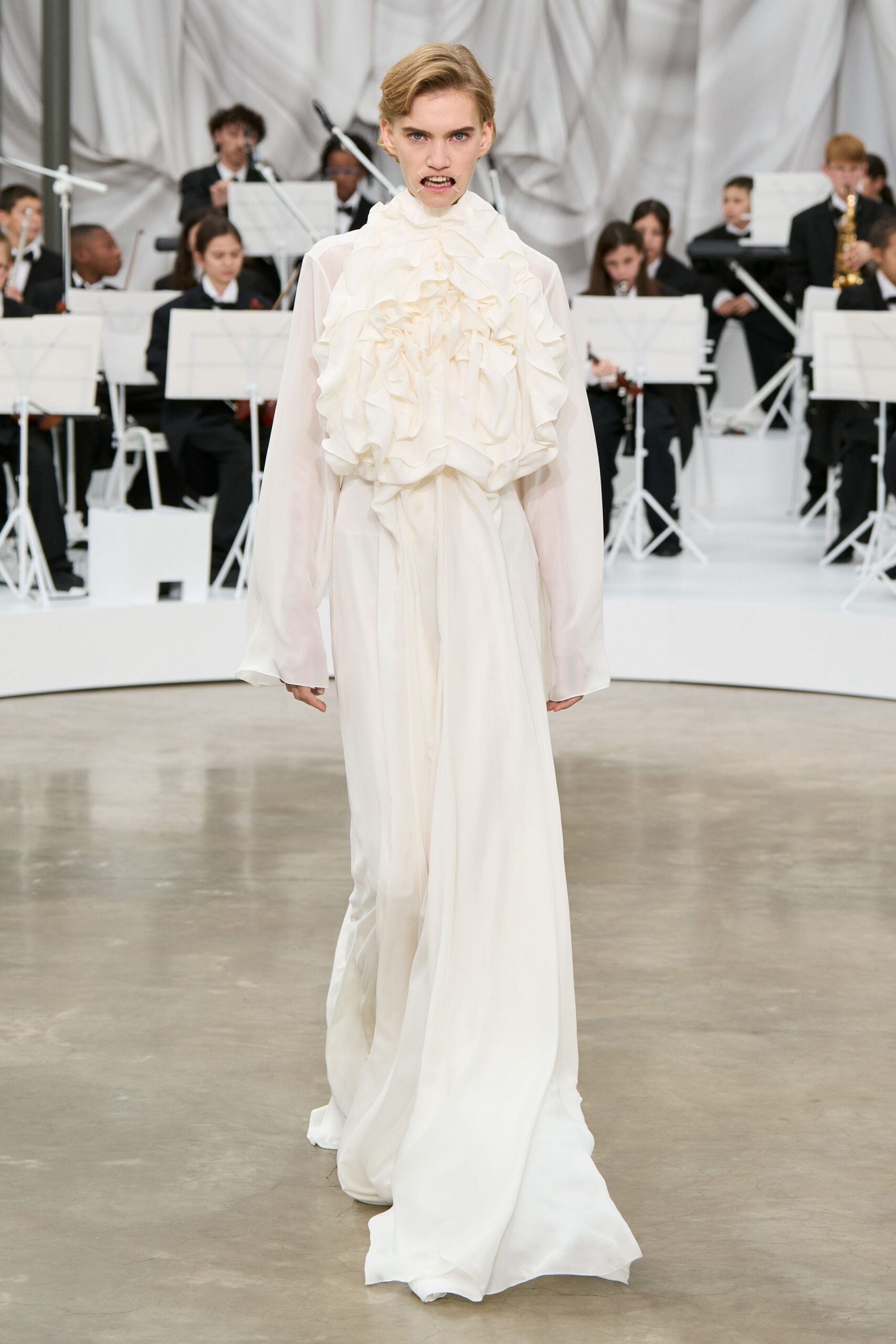 white silk ruffled gown