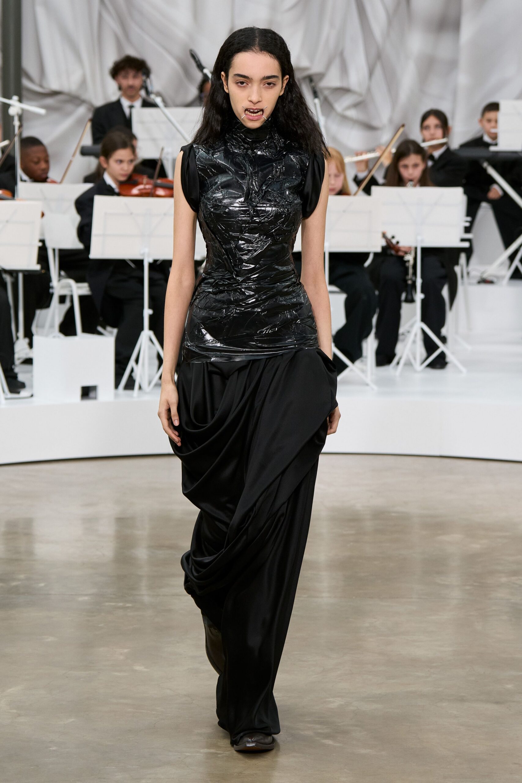 black vinyl fitted gown