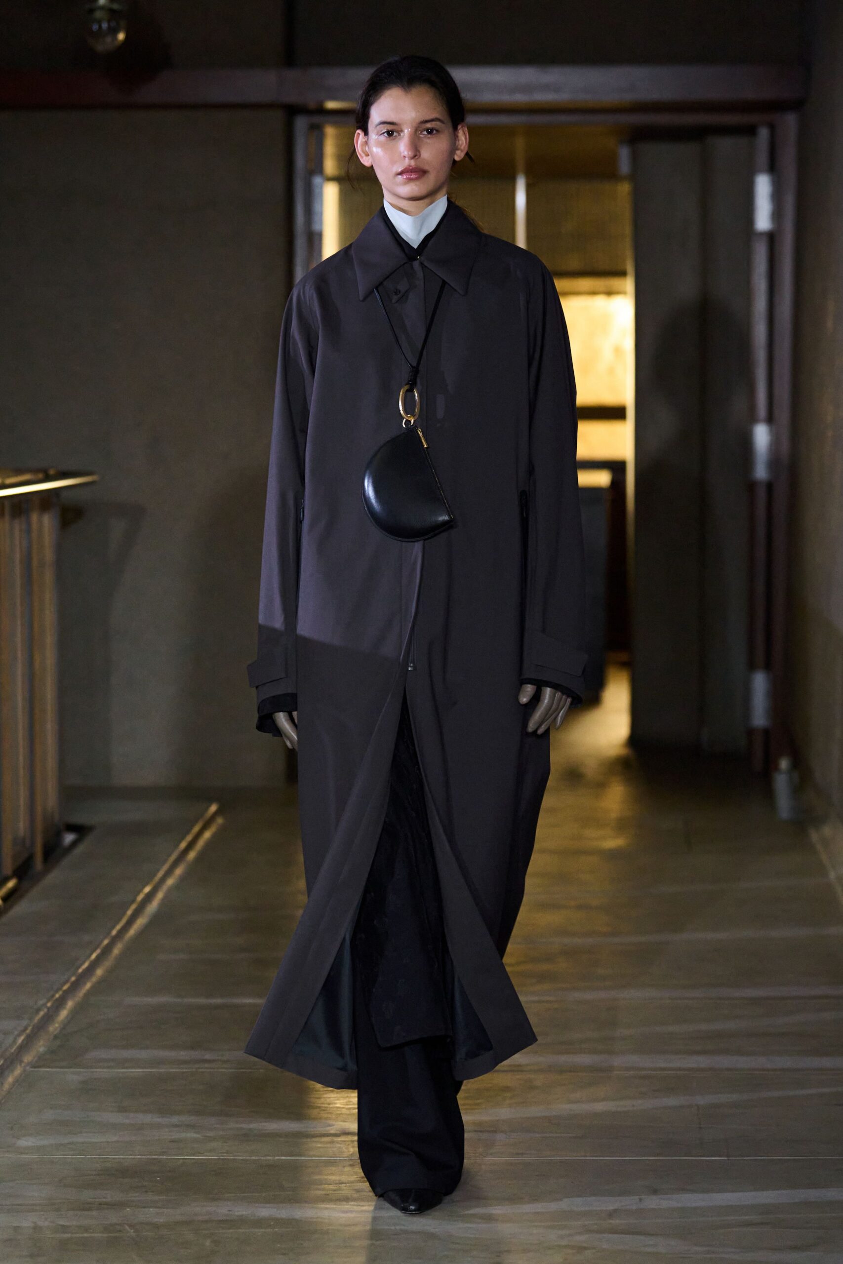black cotton long-sleeve collared oversized buttoned maxi coat