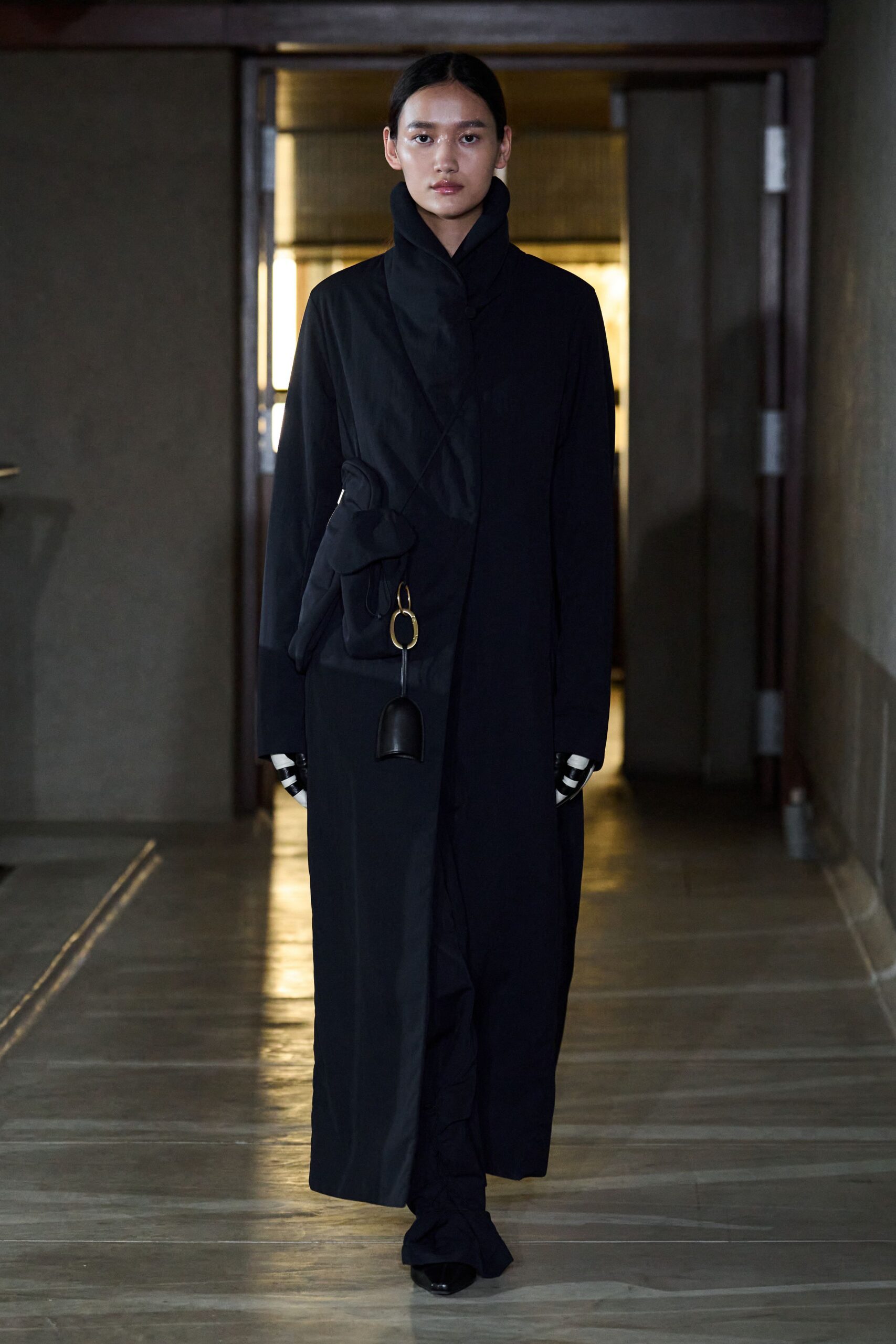 black coat with pants and accessories