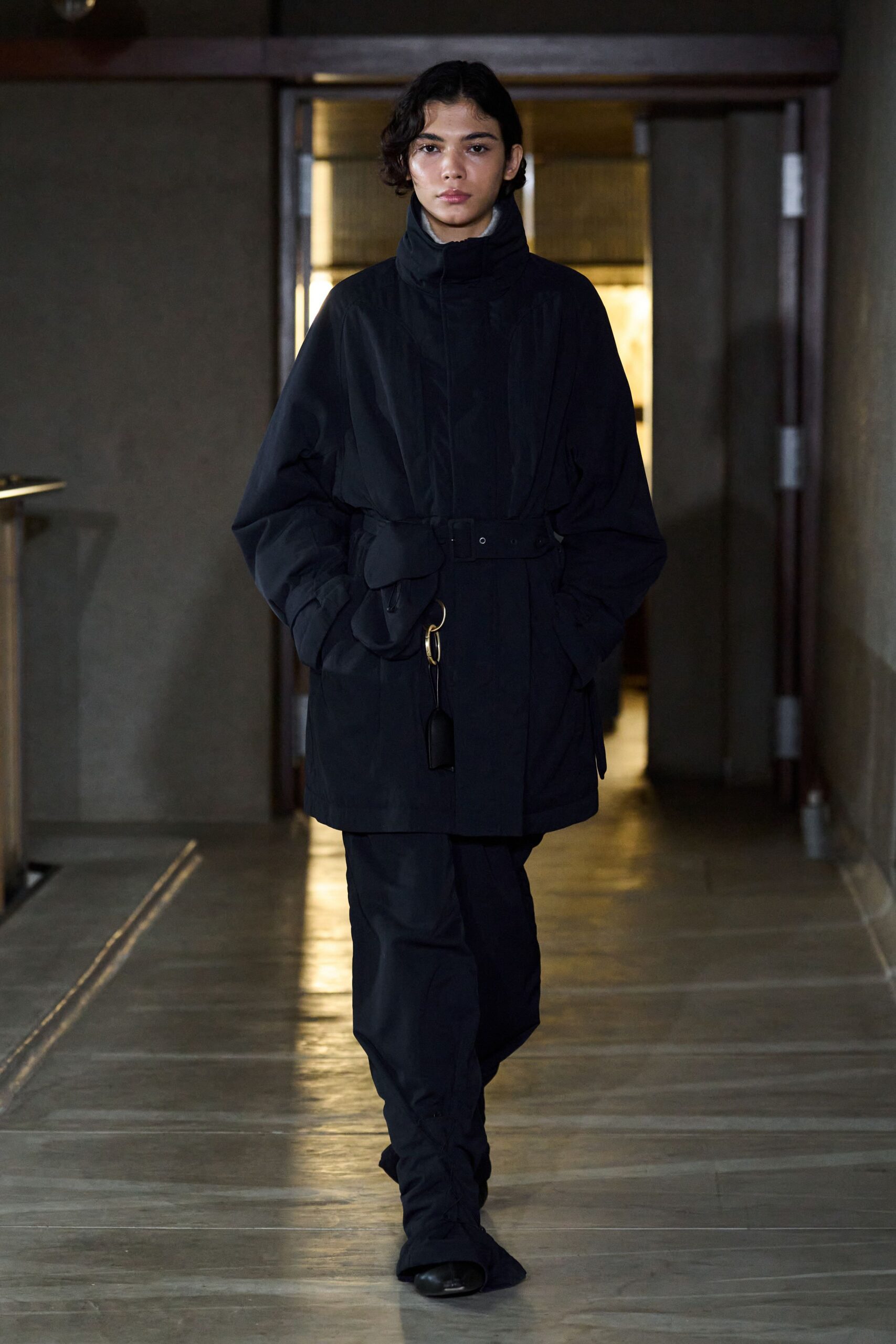 black relaxed coat with fitted pants