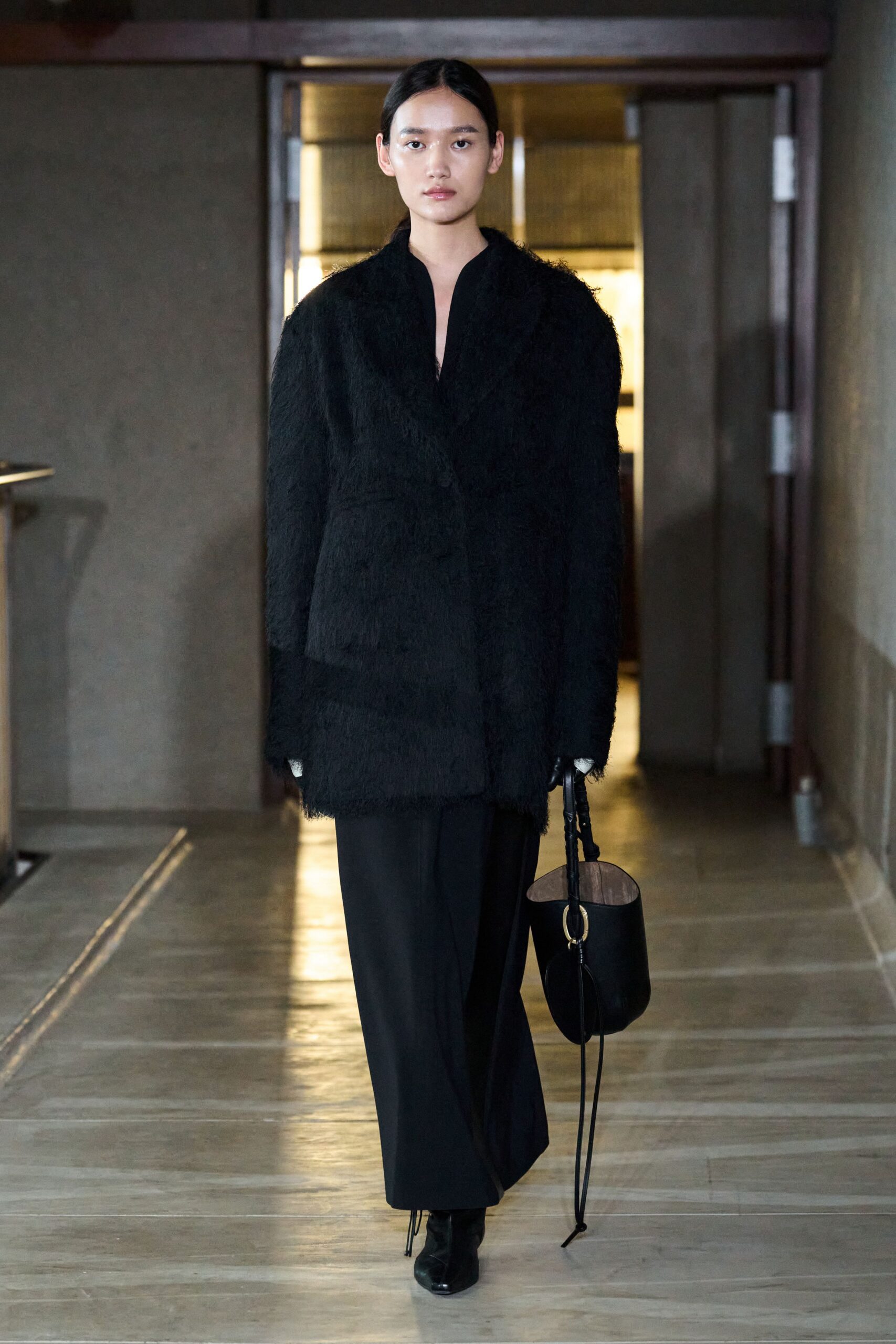 black fur long-sleeve collared oversized textured coat
