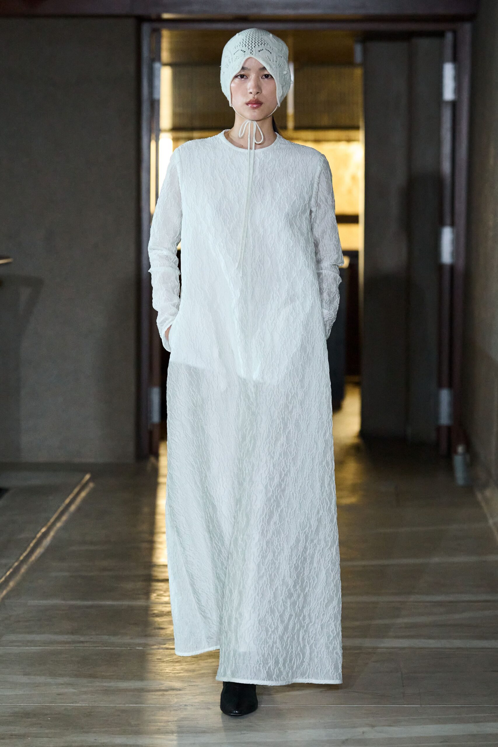 white cotton long-sleeve collared relaxed pleated flowing dress