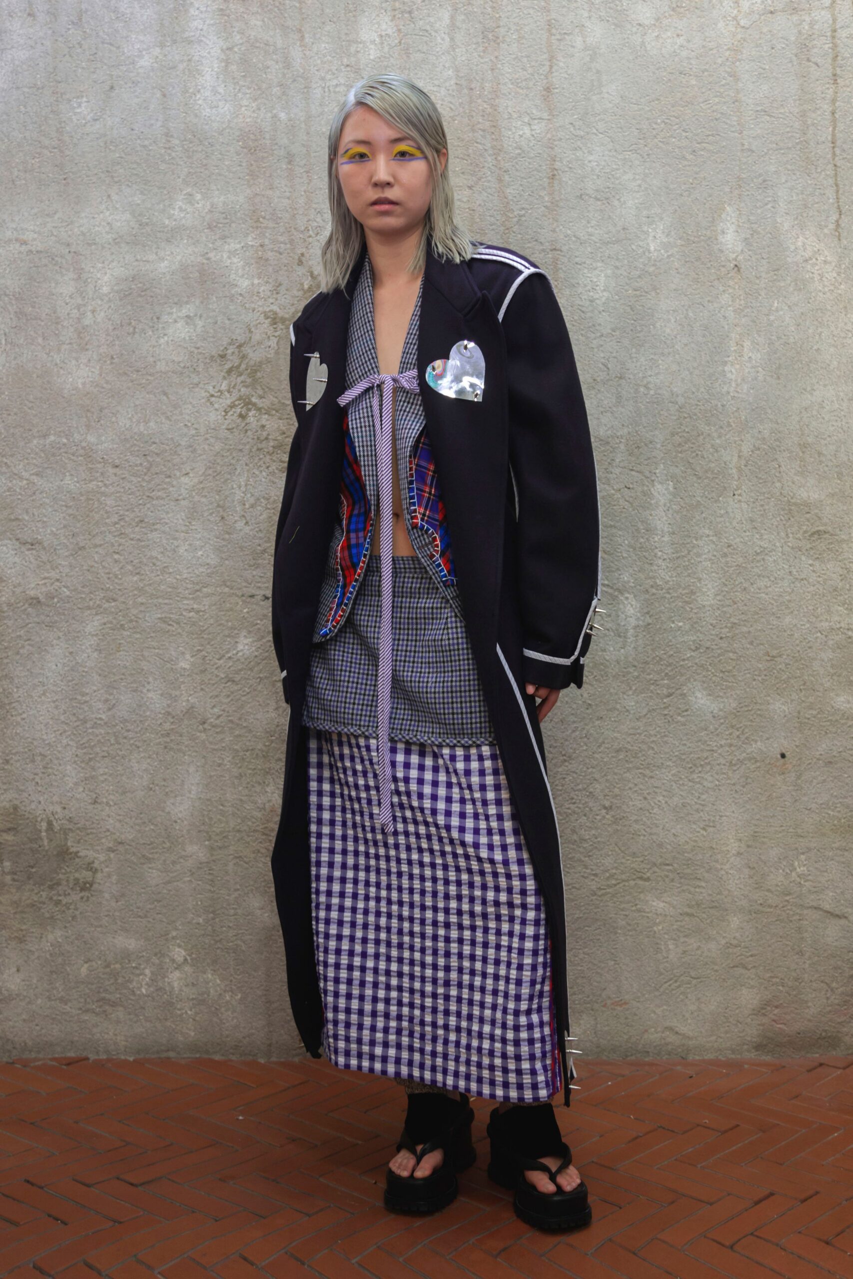 black cotton long-sleeve collared relaxed buttoned coat