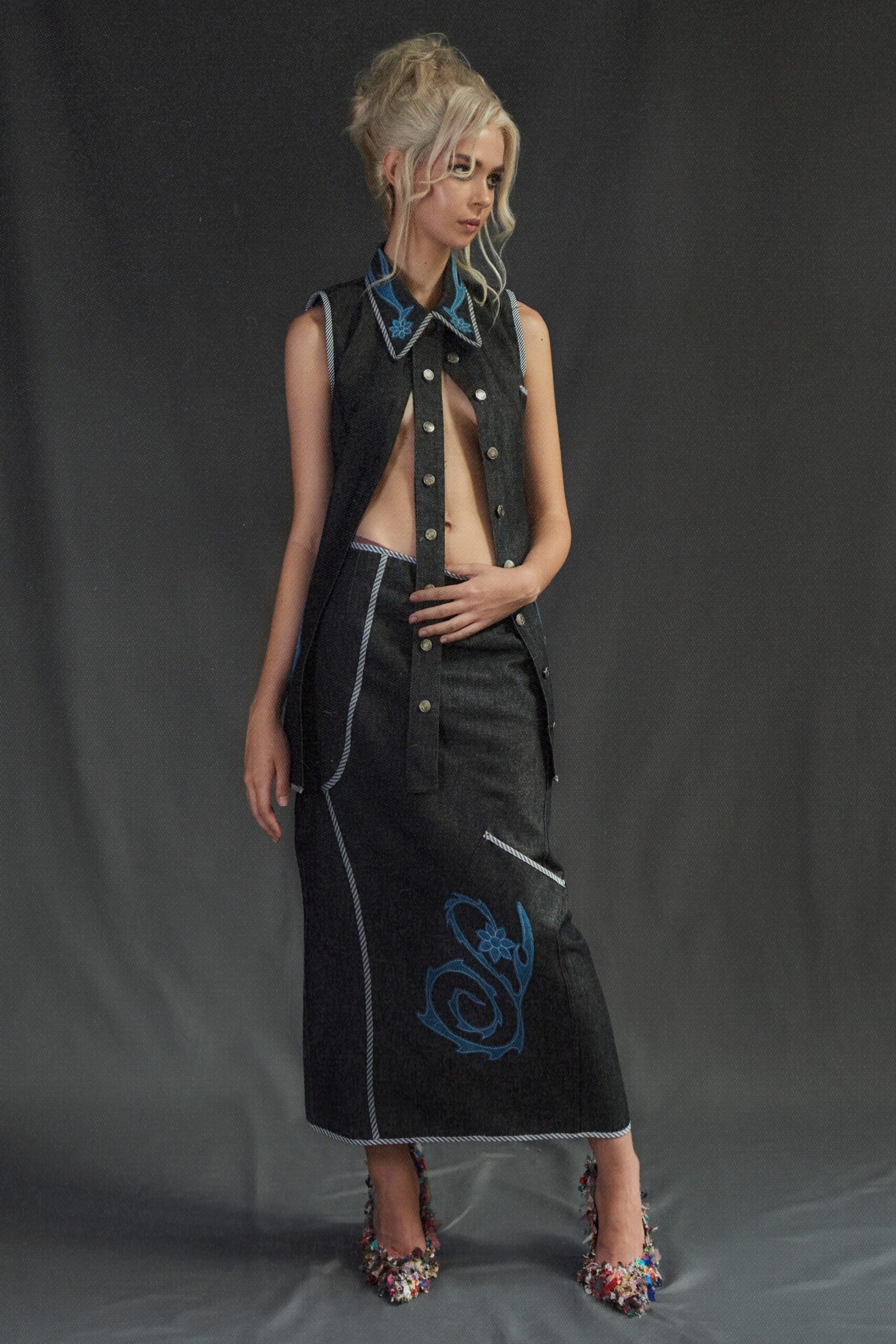 black denim sleeveless collared fitted buttoned top