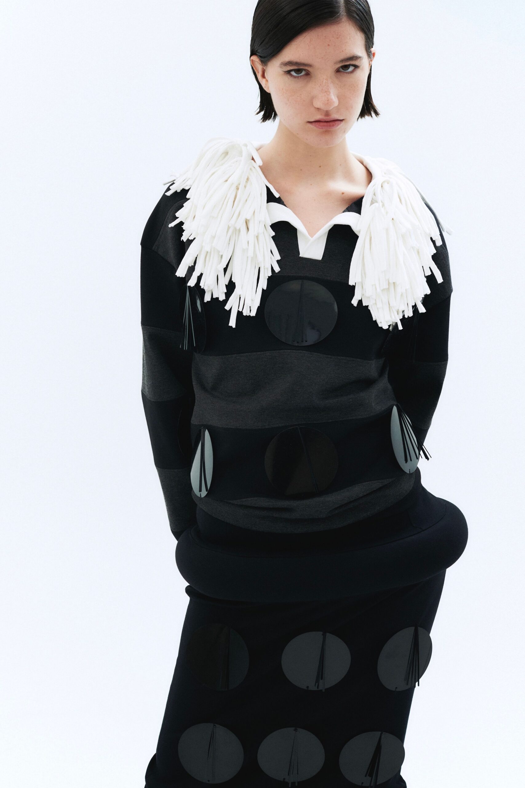 black cotton long-sleeve collared fitted layered pleated top