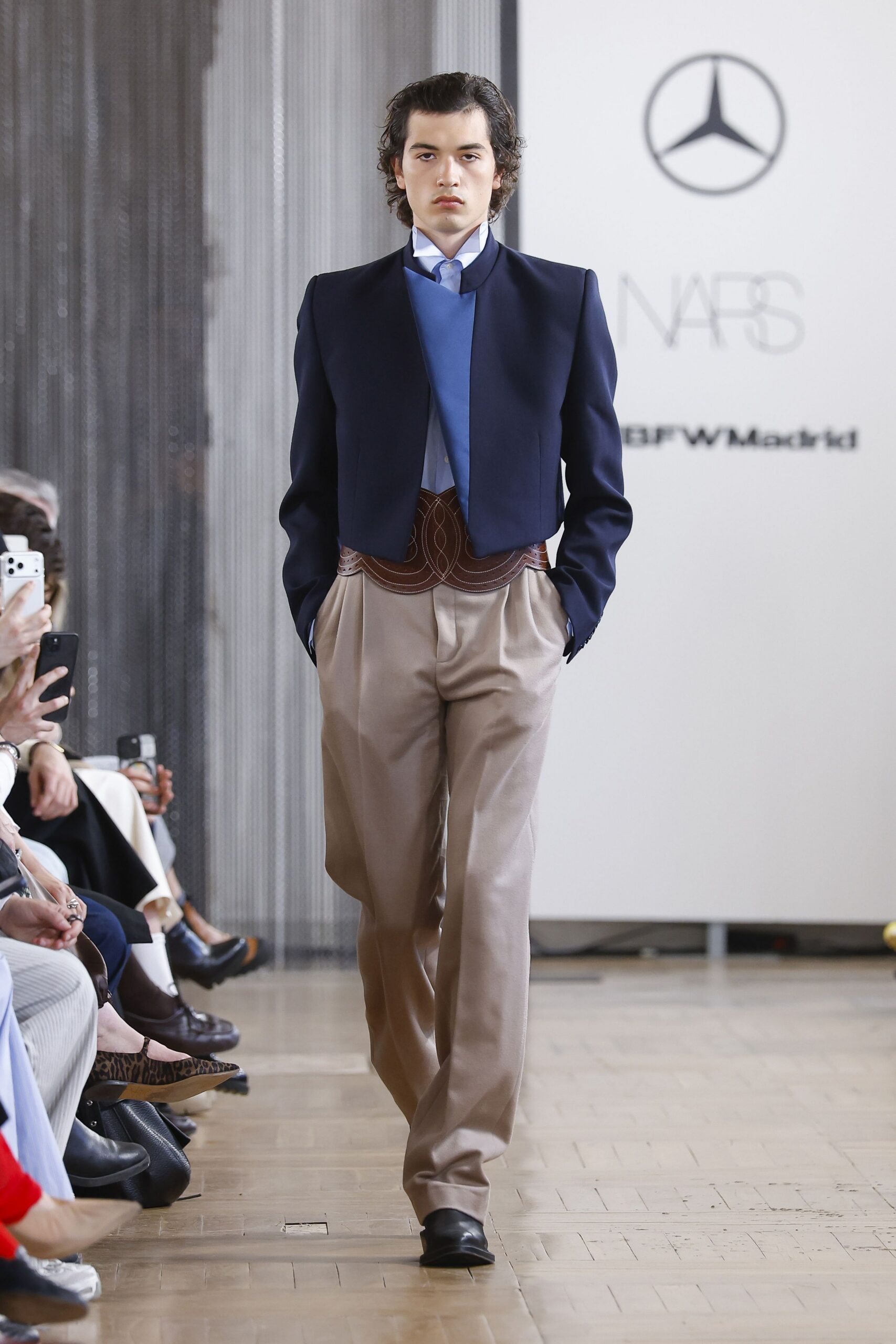 navy blazer blue top beige pants
