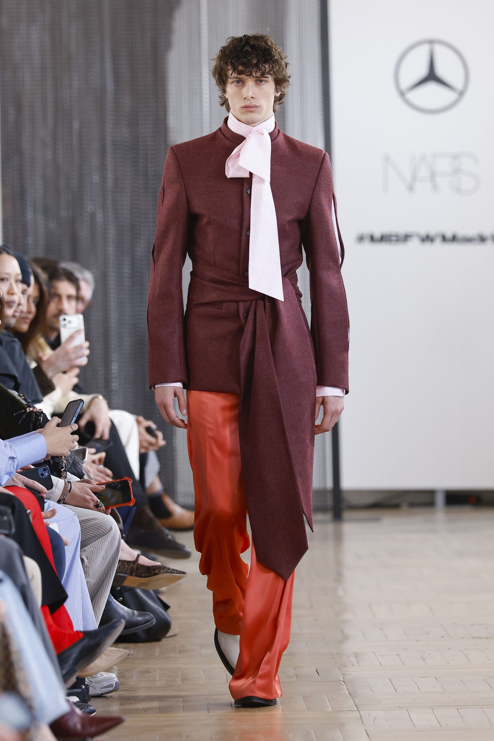 red wool long-sleeve collared fitted buttoned belted jacket
