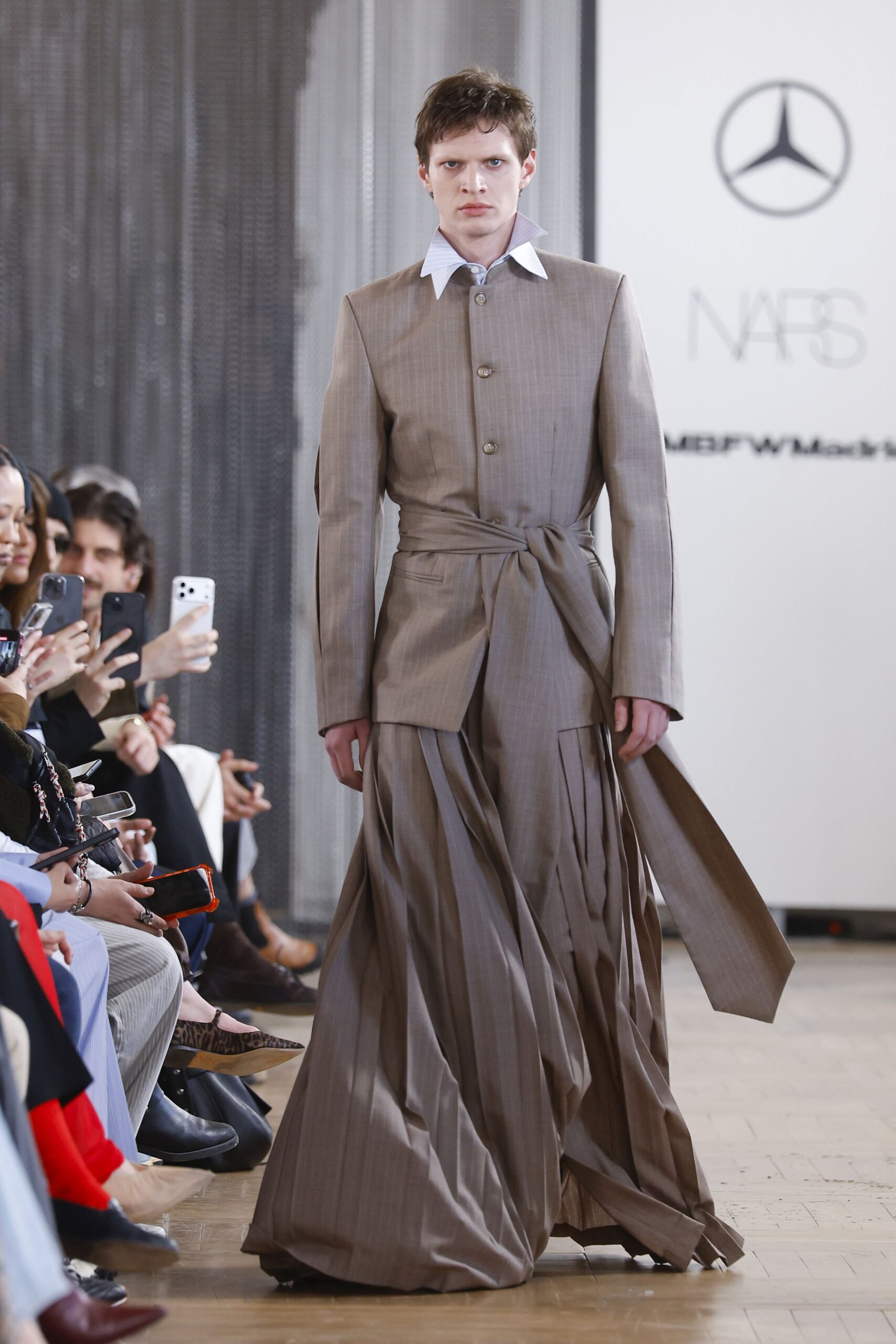 brown pleated fitted suit