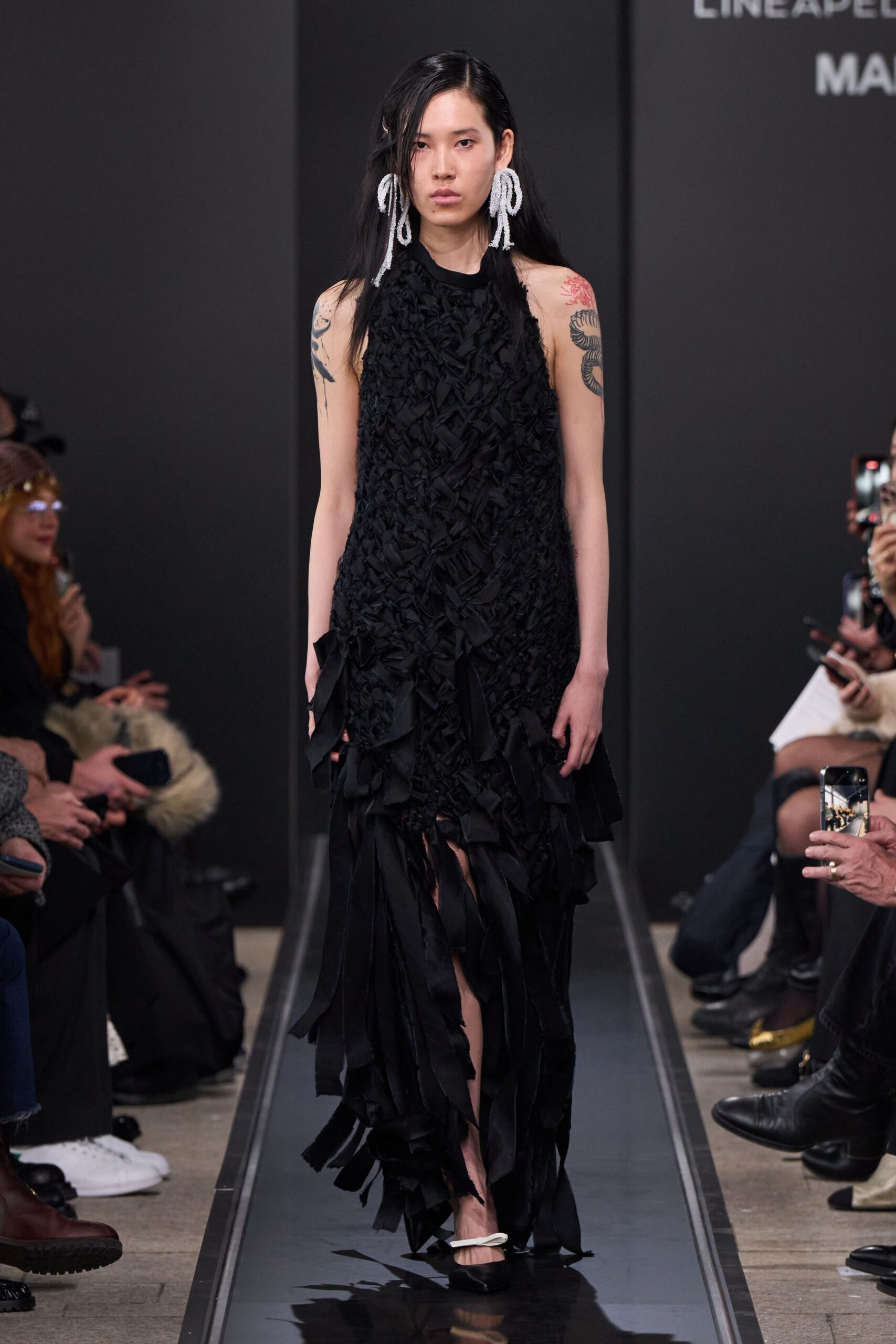 black silk sleeveless high-neck fitted ruffled layered gown