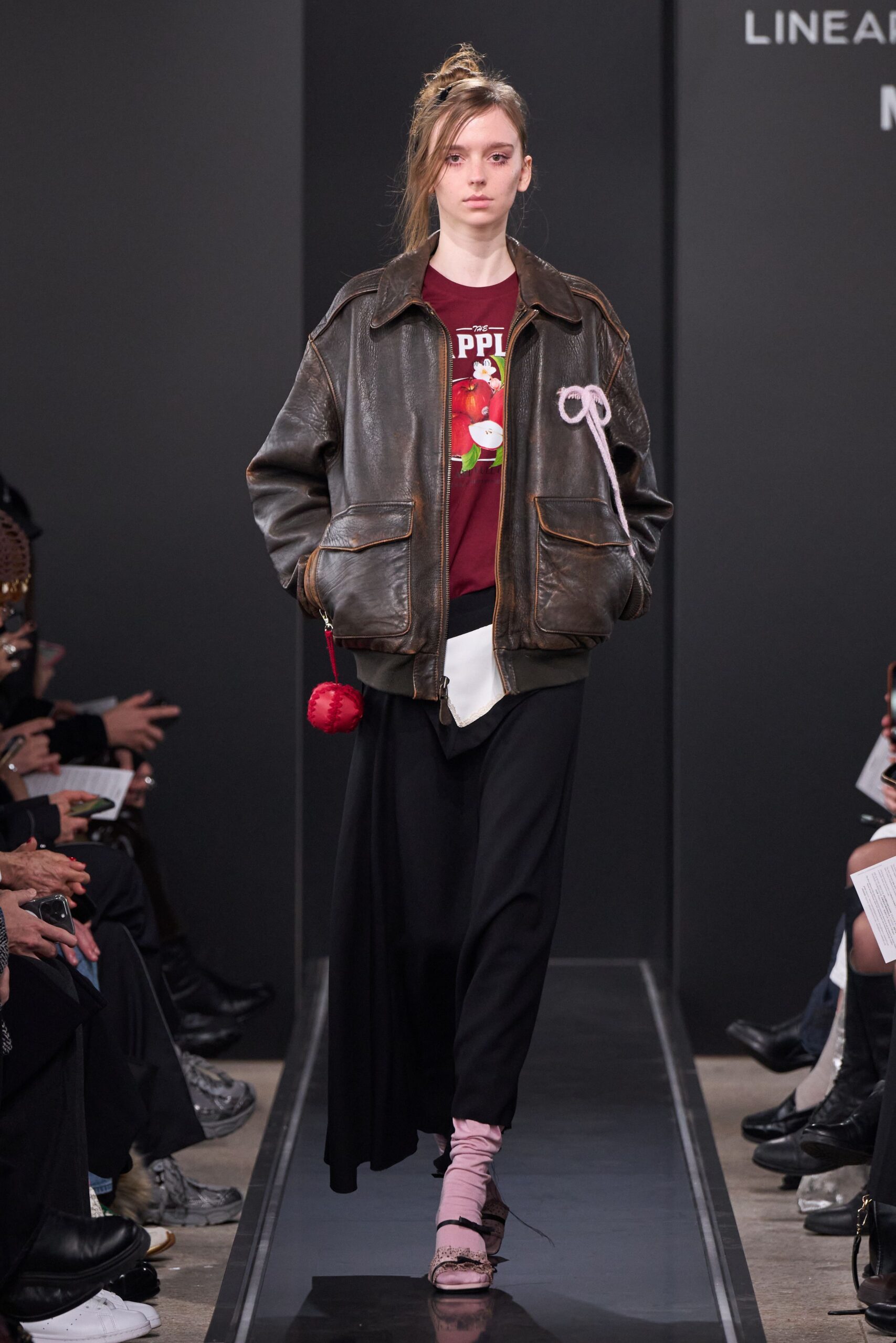 brown leather jacket with red top