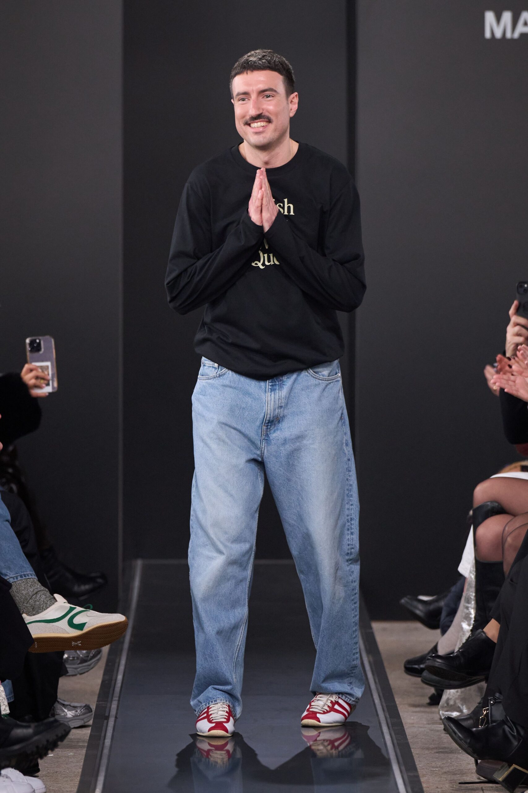 black relaxed shirt with blue jeans