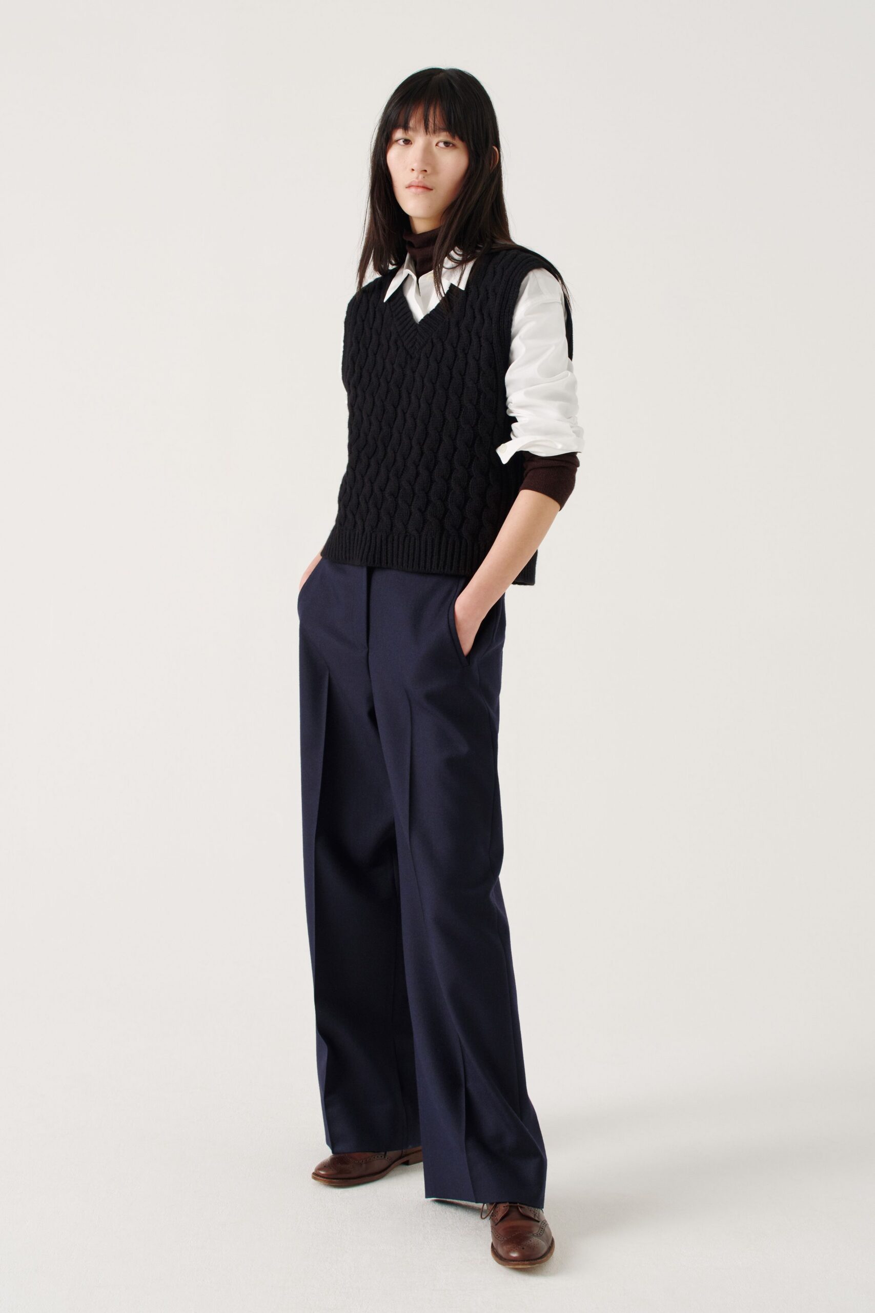 black wool sleeveless relaxed sweater