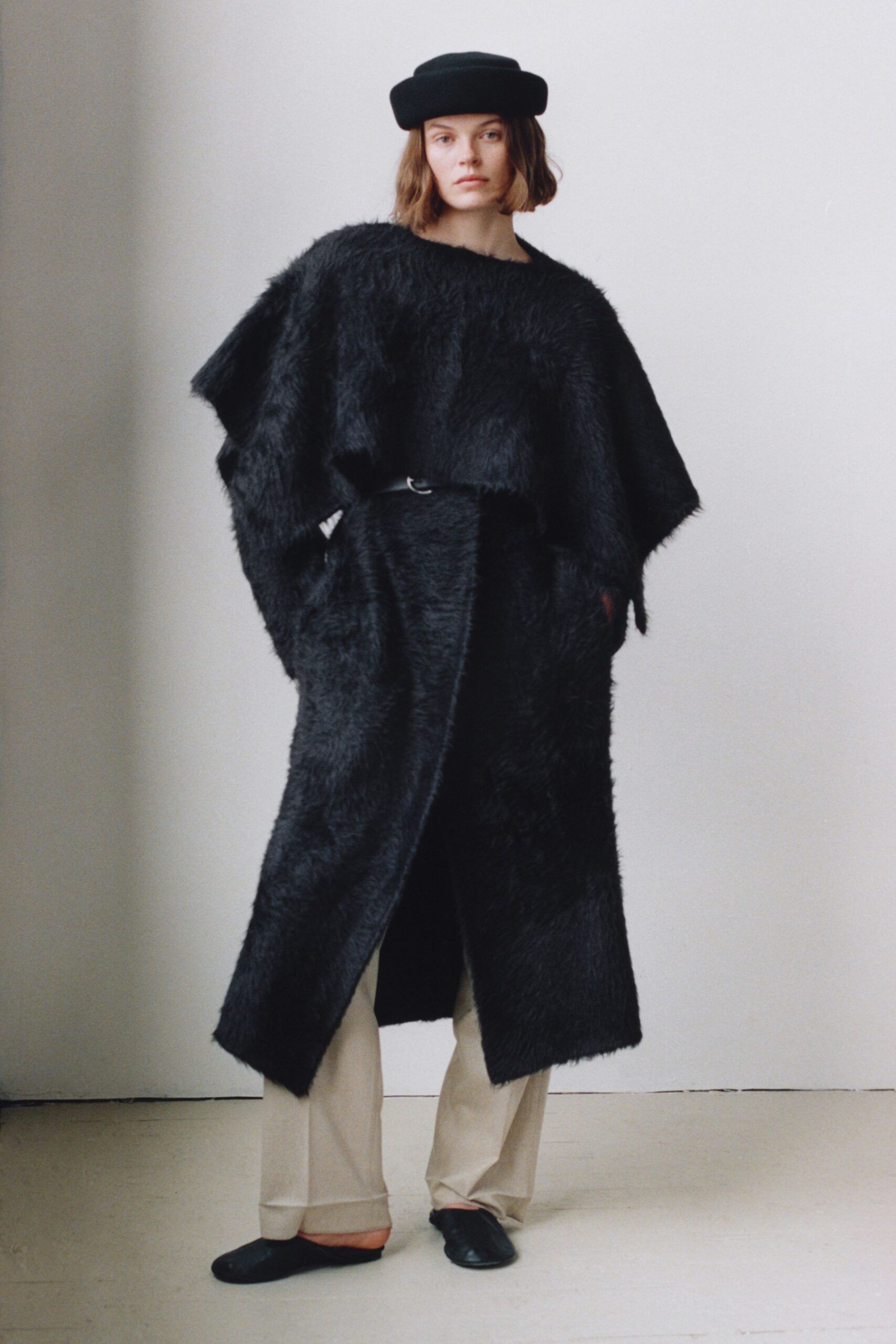 black fur sleeveless relaxed fringed maxi cape