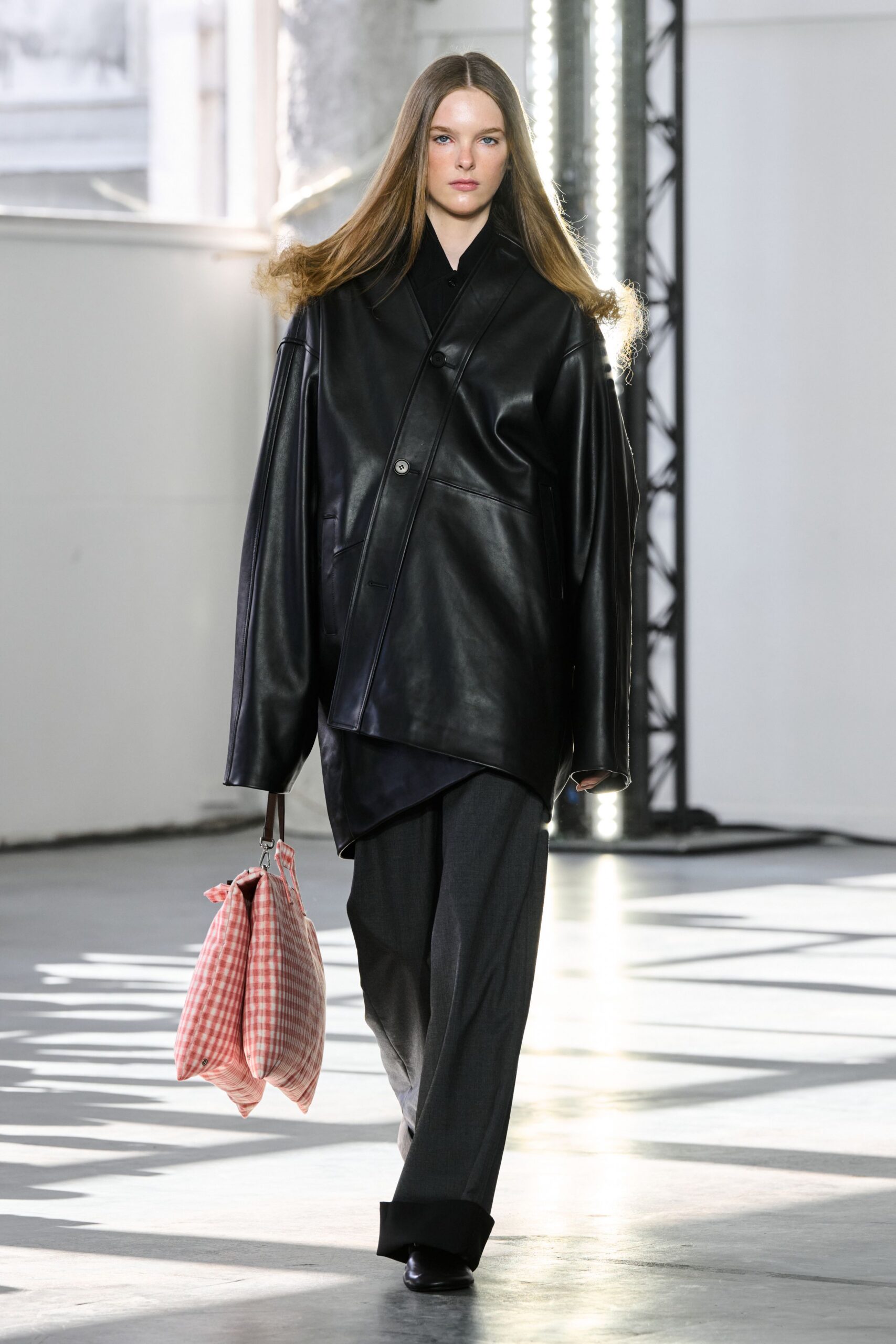black leather long-sleeve collared oversized jacket