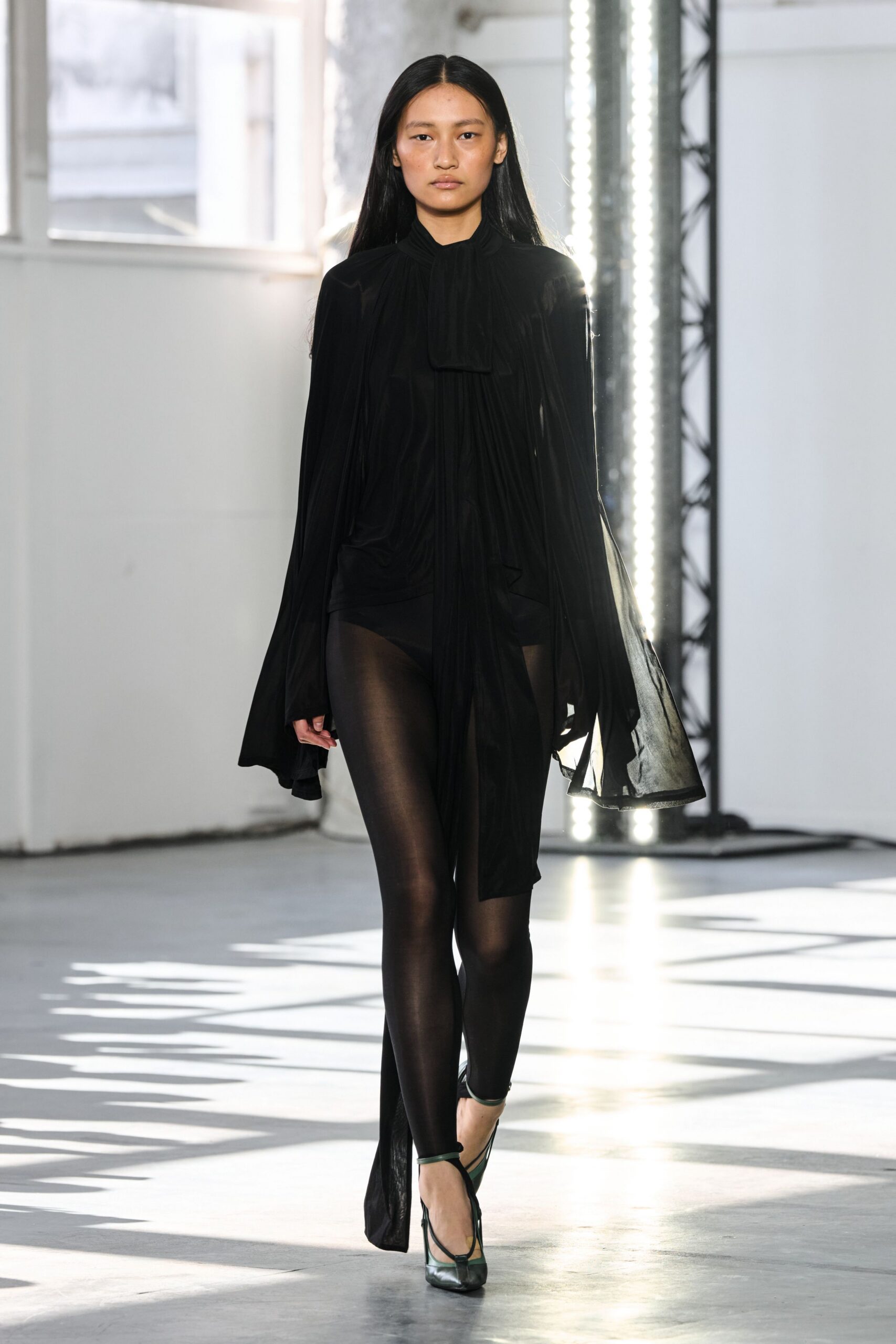 black silk long-sleeve collared fitted draped flowing dress