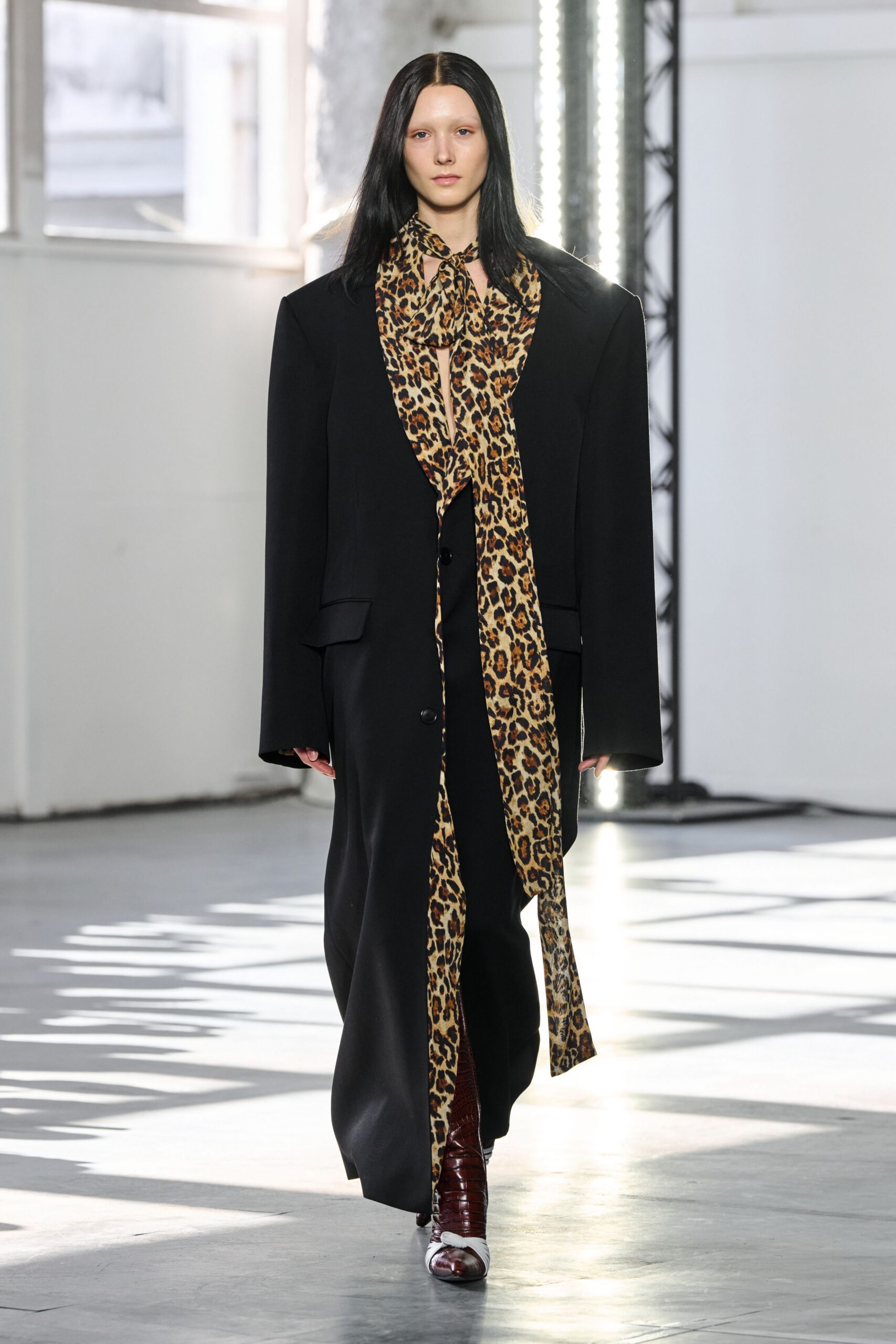 black wool long-sleeve collared oversized buttoned maxi coat