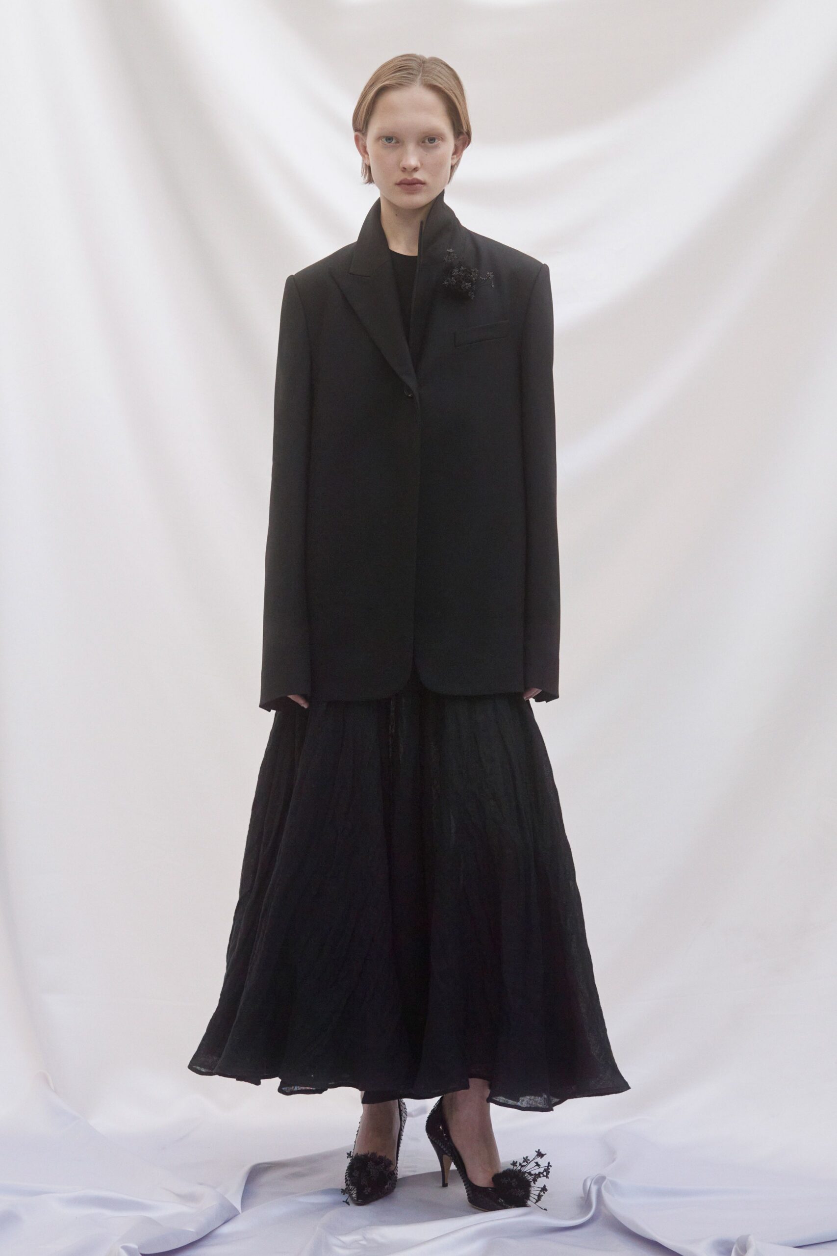 black silk long-sleeve relaxed pleated flowing maxi skirt