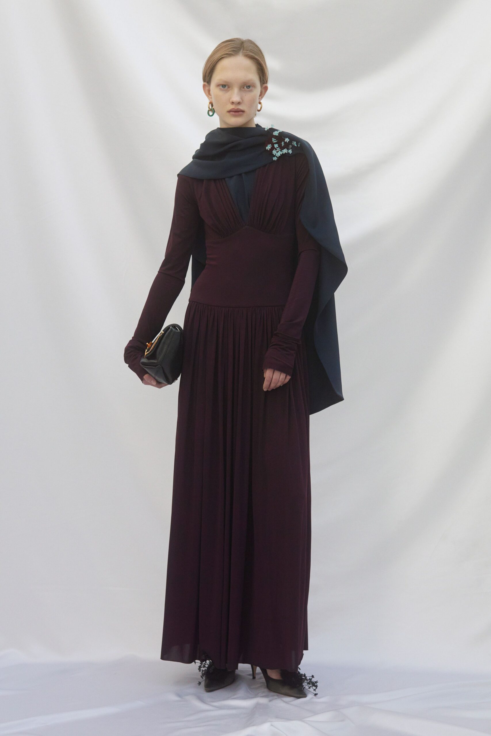 red silk long-sleeve v-neck fitted pleated maxi gown