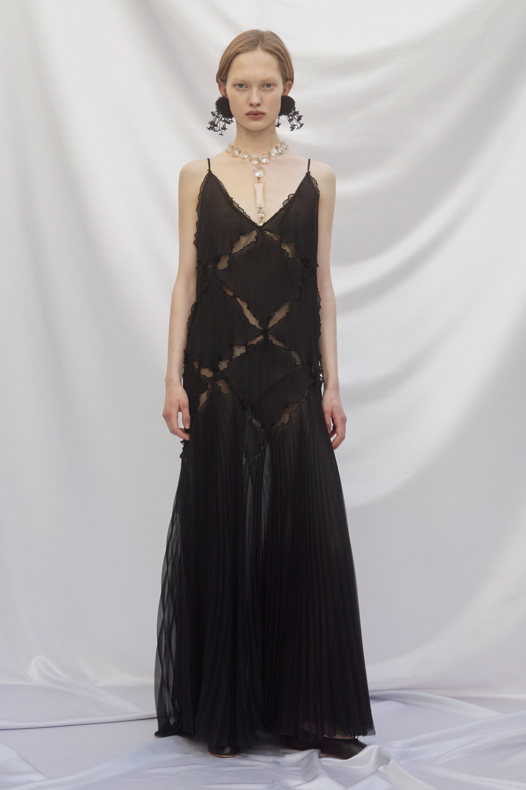 black silk sleeveless v-neck fitted pleated draped gown