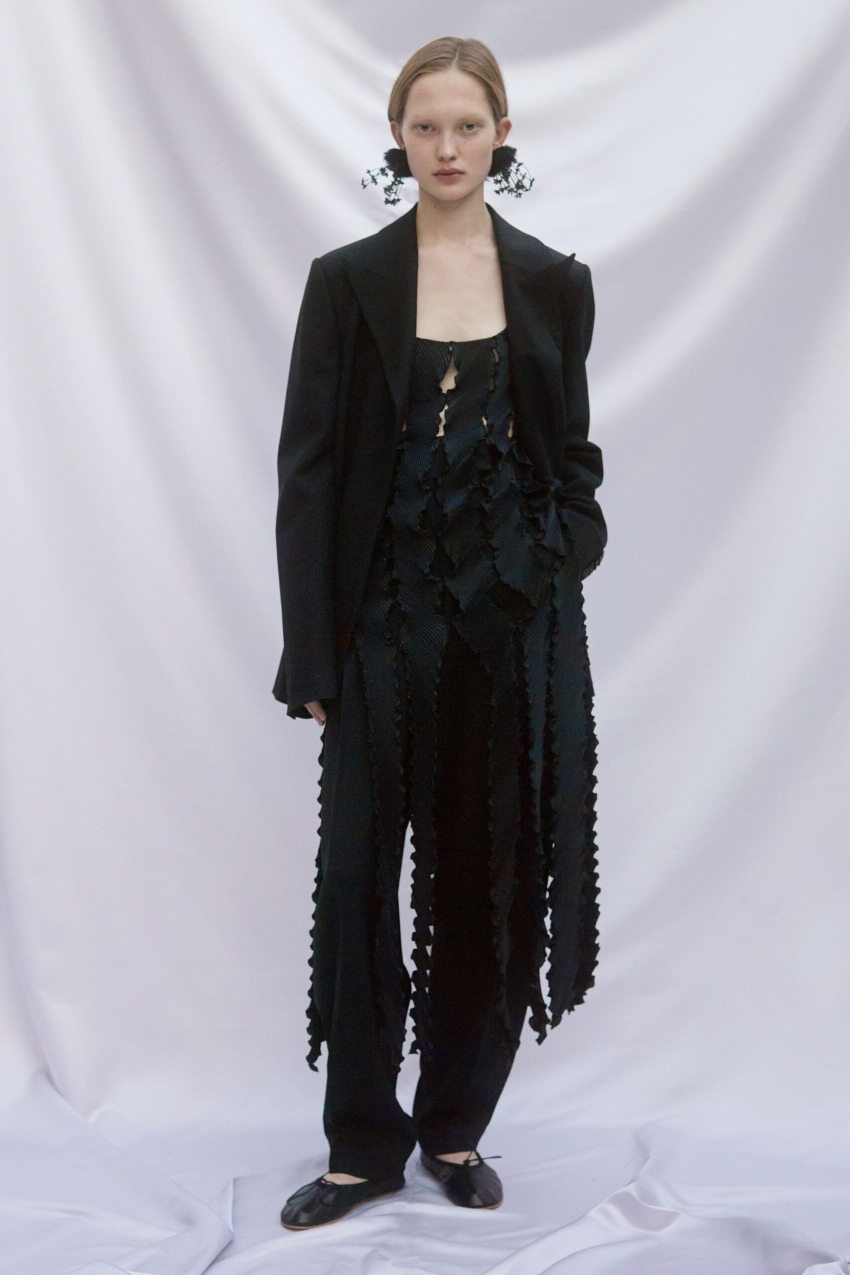 black sleeveless fitted fringed jumpsuit