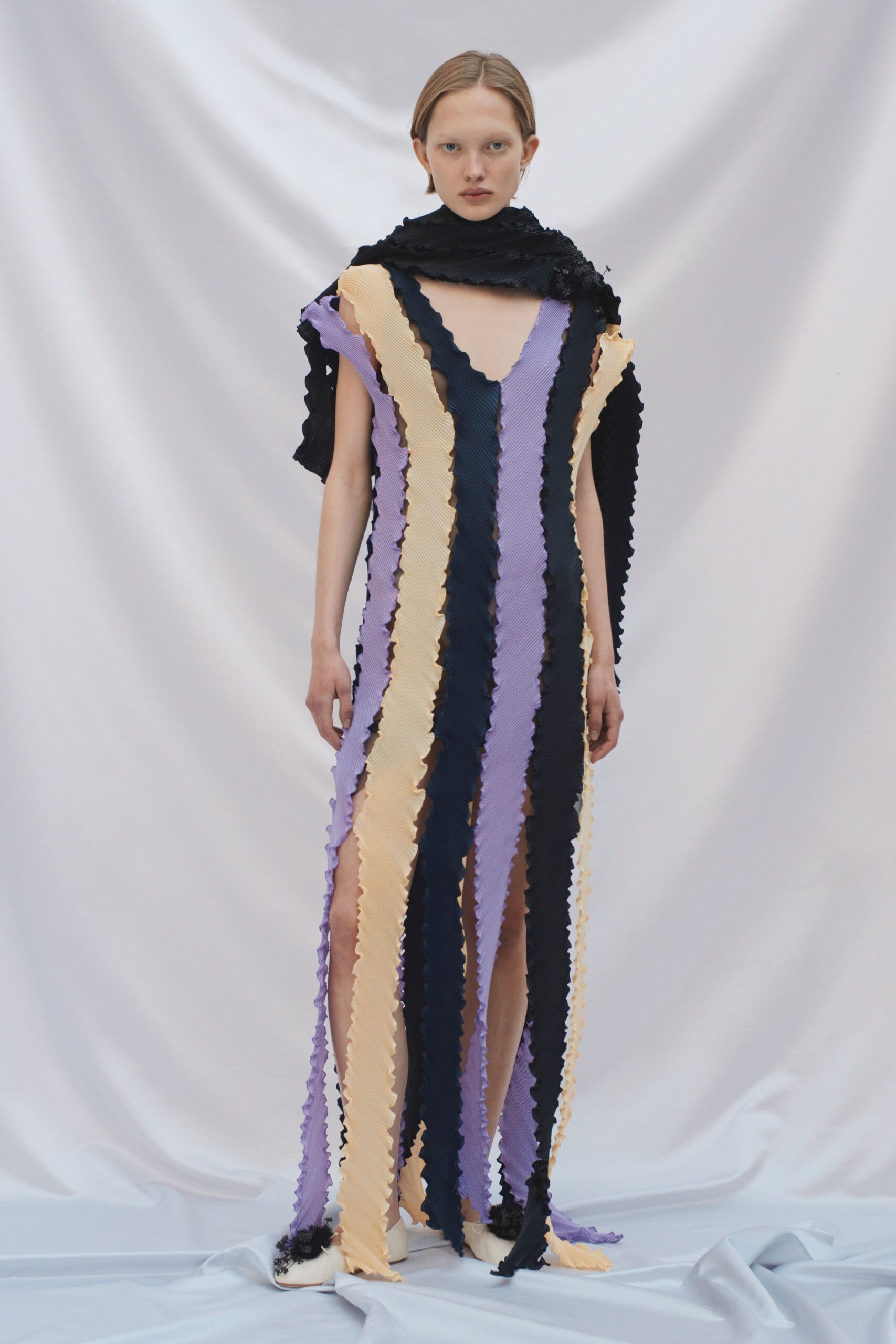 black silk sleeveless v-neck fitted layered fringed gown