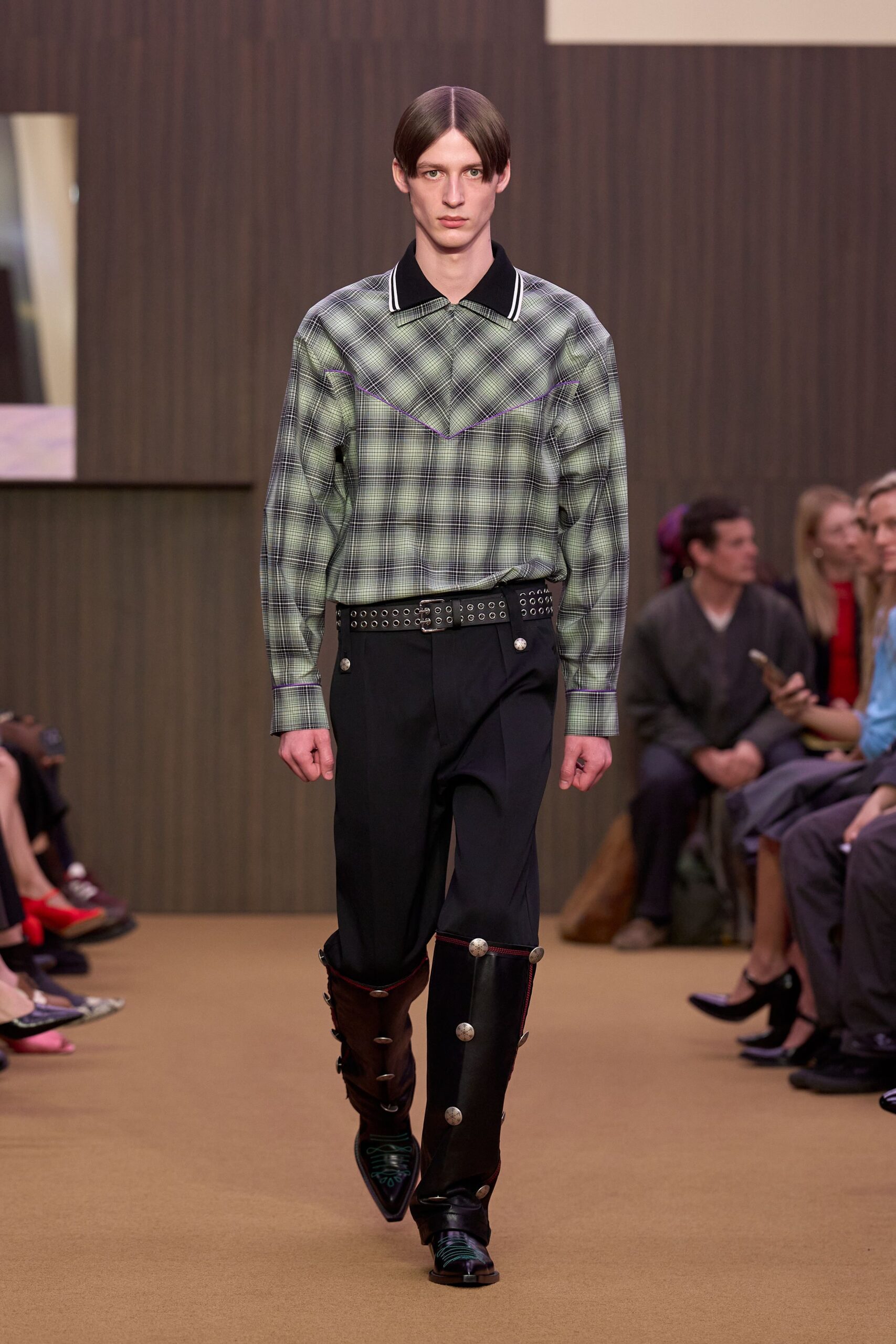 green checked shirt with black pants