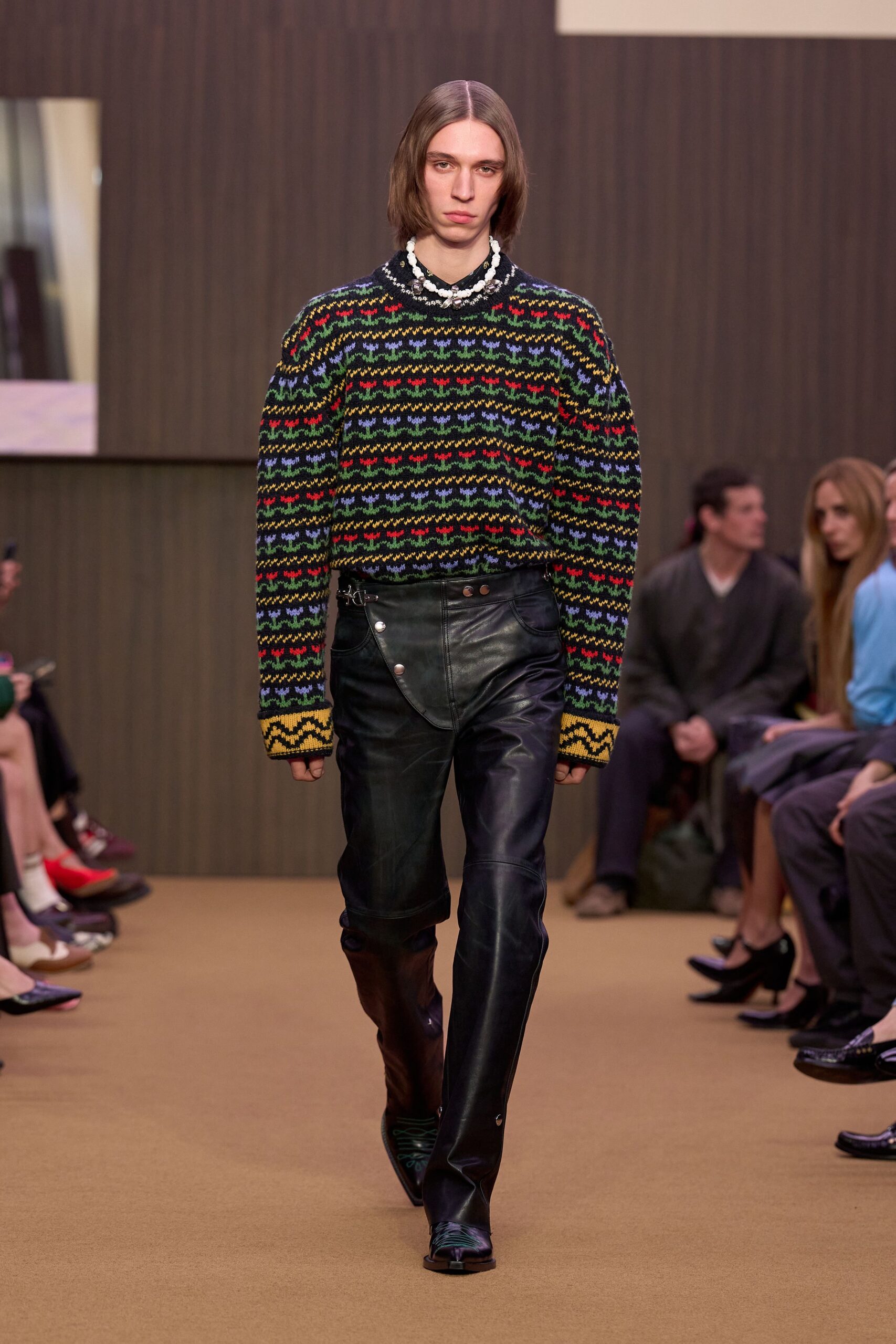 oversized striped sweater and leather pants