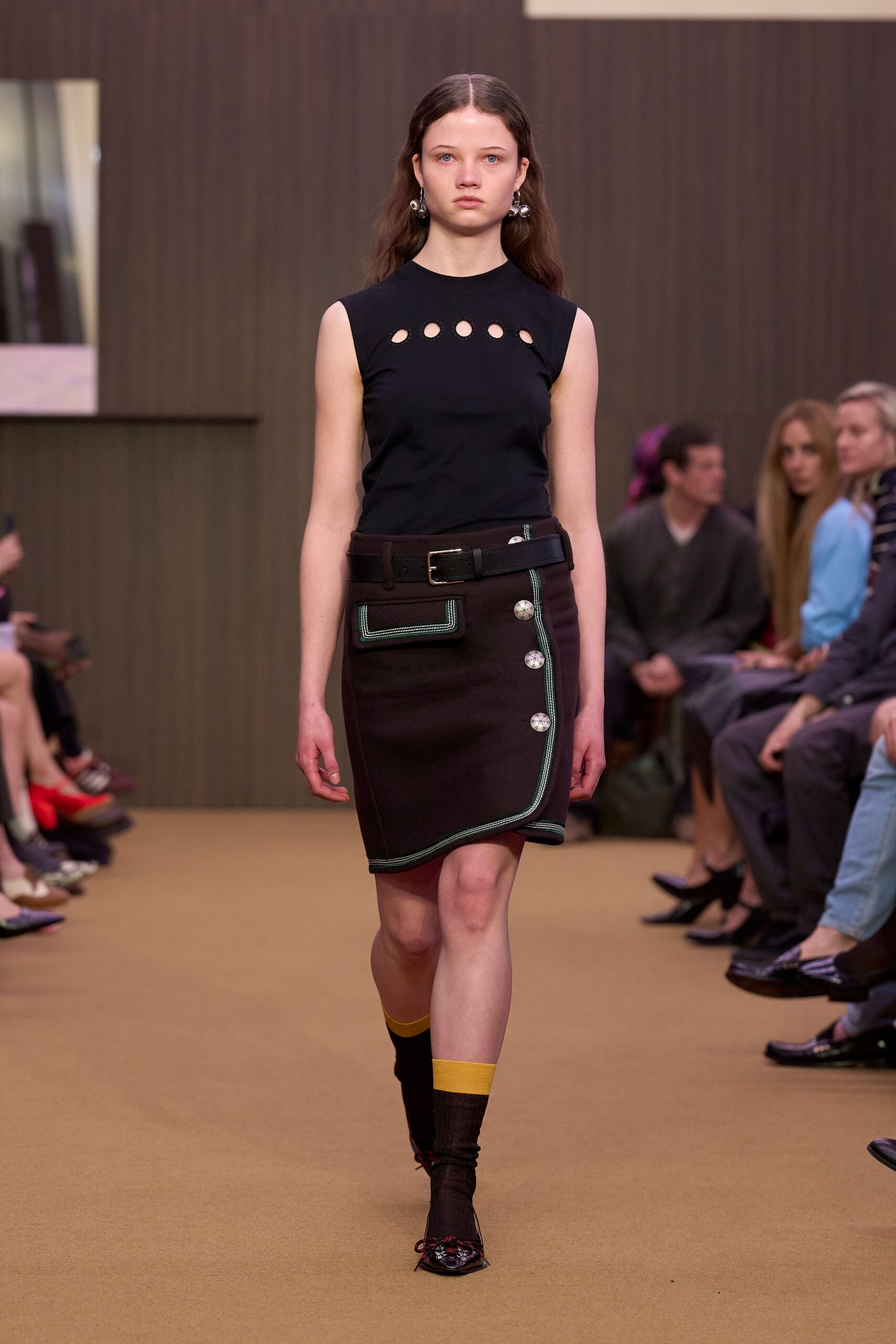 black sleeveless high-neck fitted buttoned top