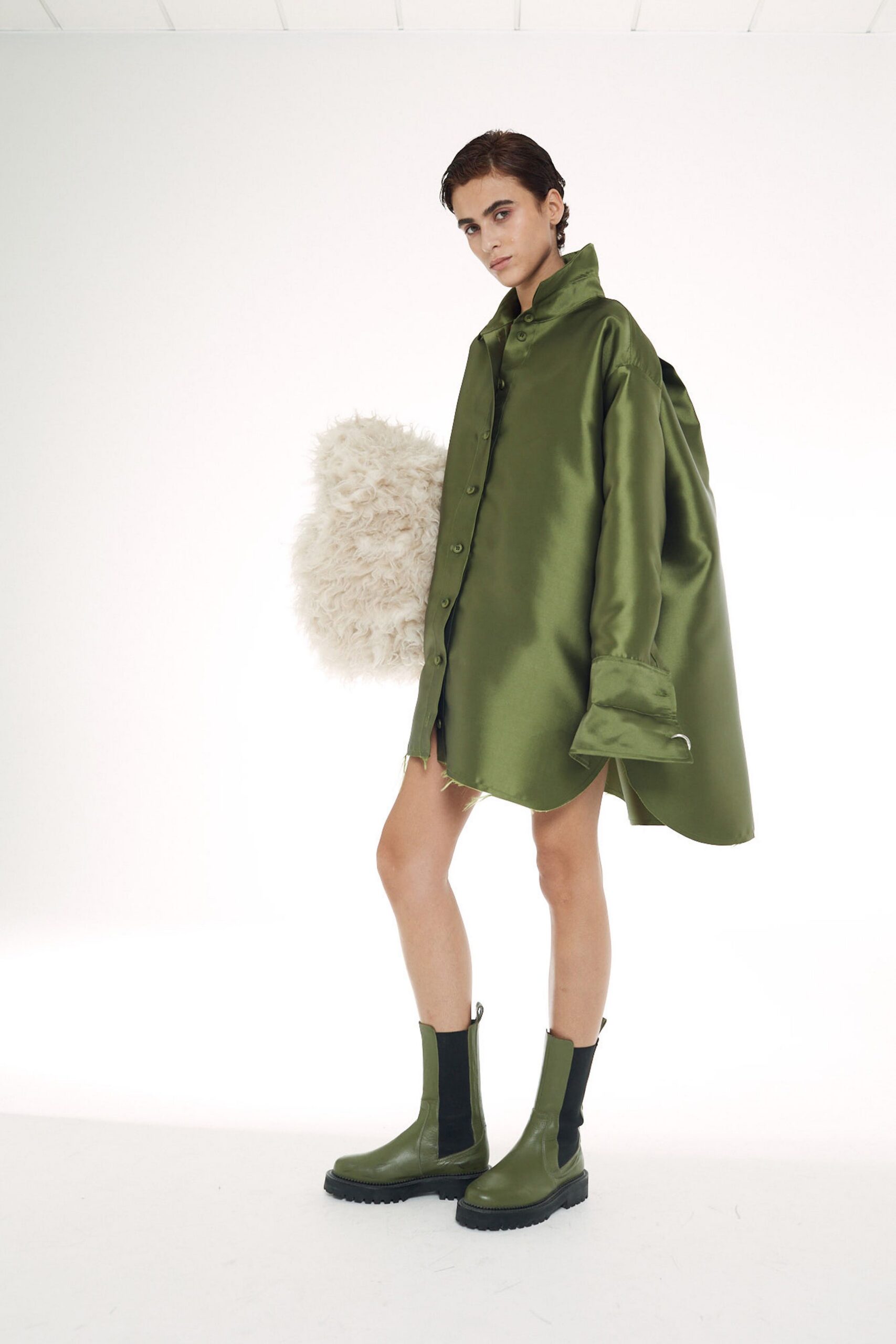 green leather fitted boots
