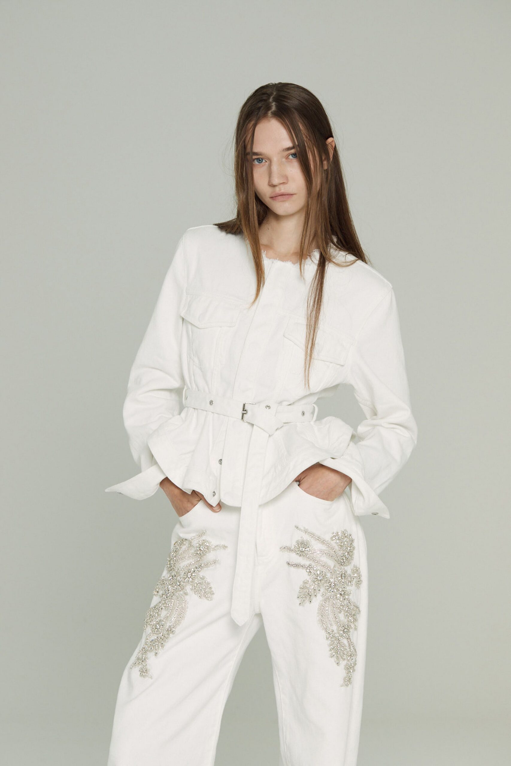 white cotton long-sleeve collared fitted buttoned belted jacket