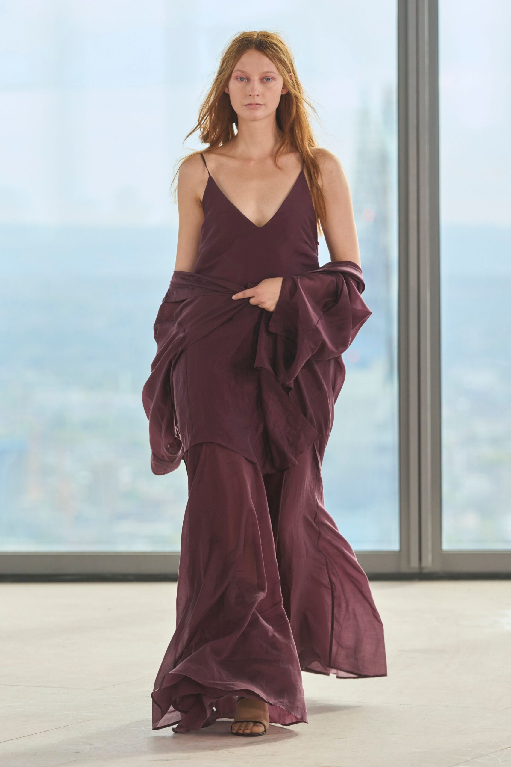 purple silk sleeveless v-neck fitted flowing sheer gown