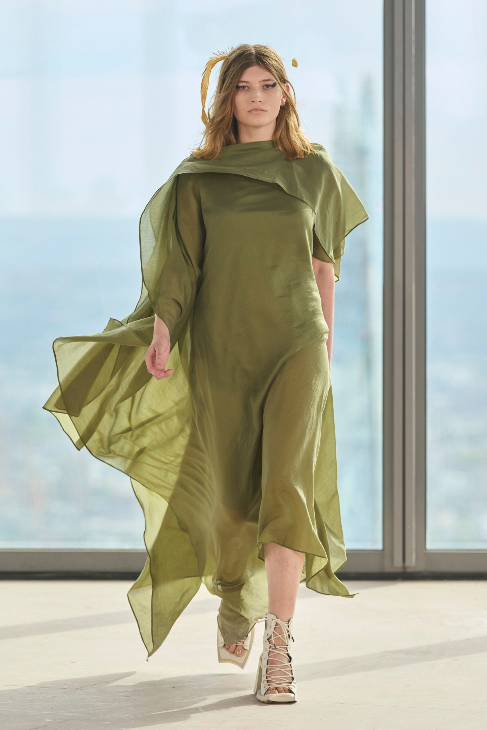 green silk sleeveless high-neck relaxed draped flowing dress